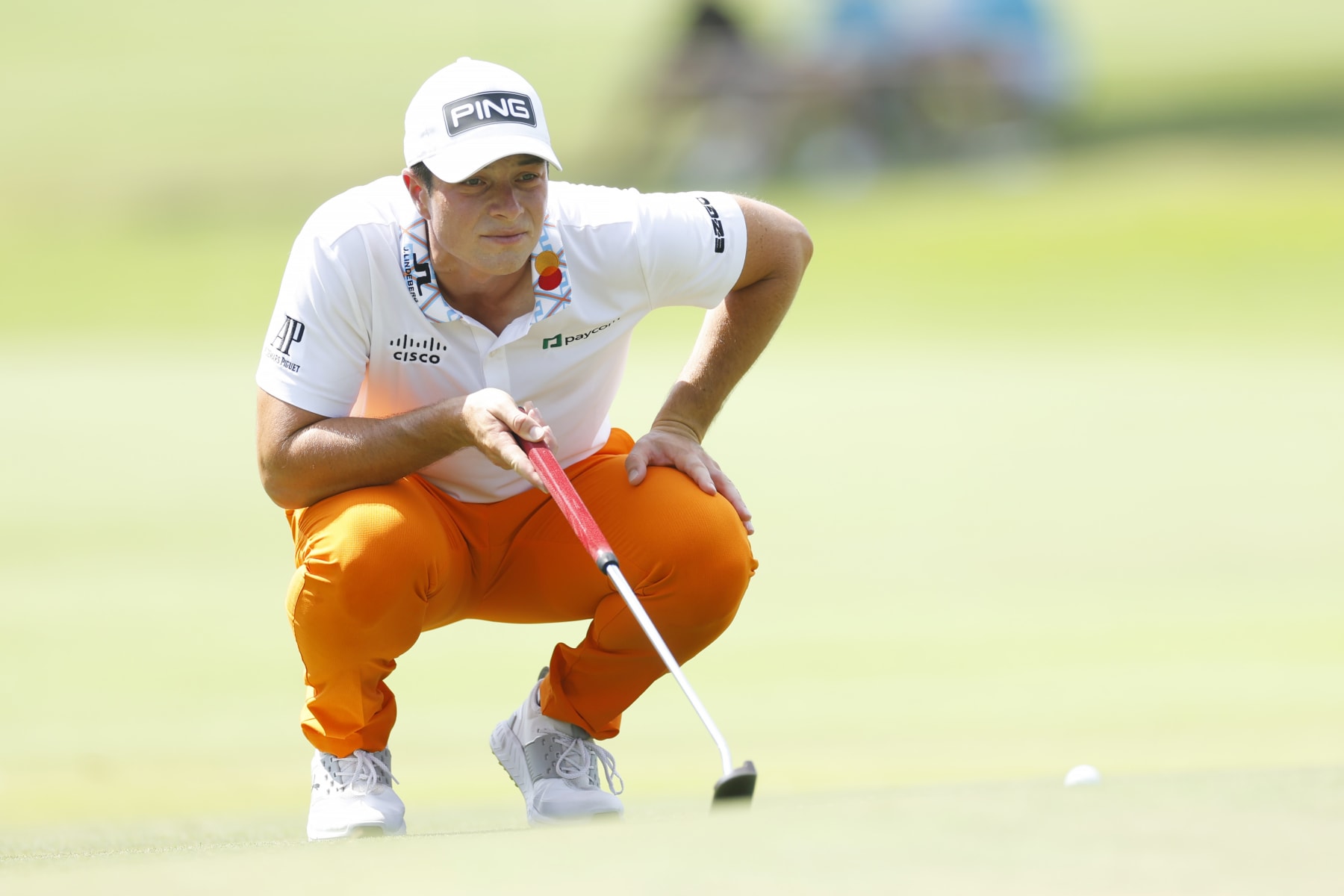 ATLANTA, GEORGIA - AUGUST 26:  Viktor Hovland of Norway lines up a putt on the fourth green during the third round of the TOUR Championship at East Lake Golf Club on August 26, 2023 in Atlanta, Georgia. (Photo by Mike Ehrmann/Getty Images)
