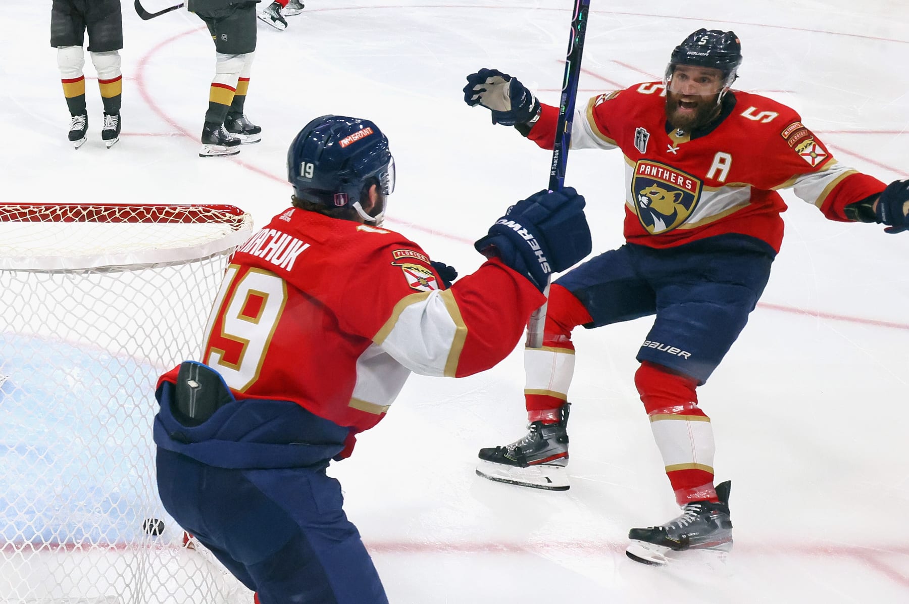 Matthew Tkachuk and Aaron Ekblad celebrate the Panthers' game-winning goal Thursday night.