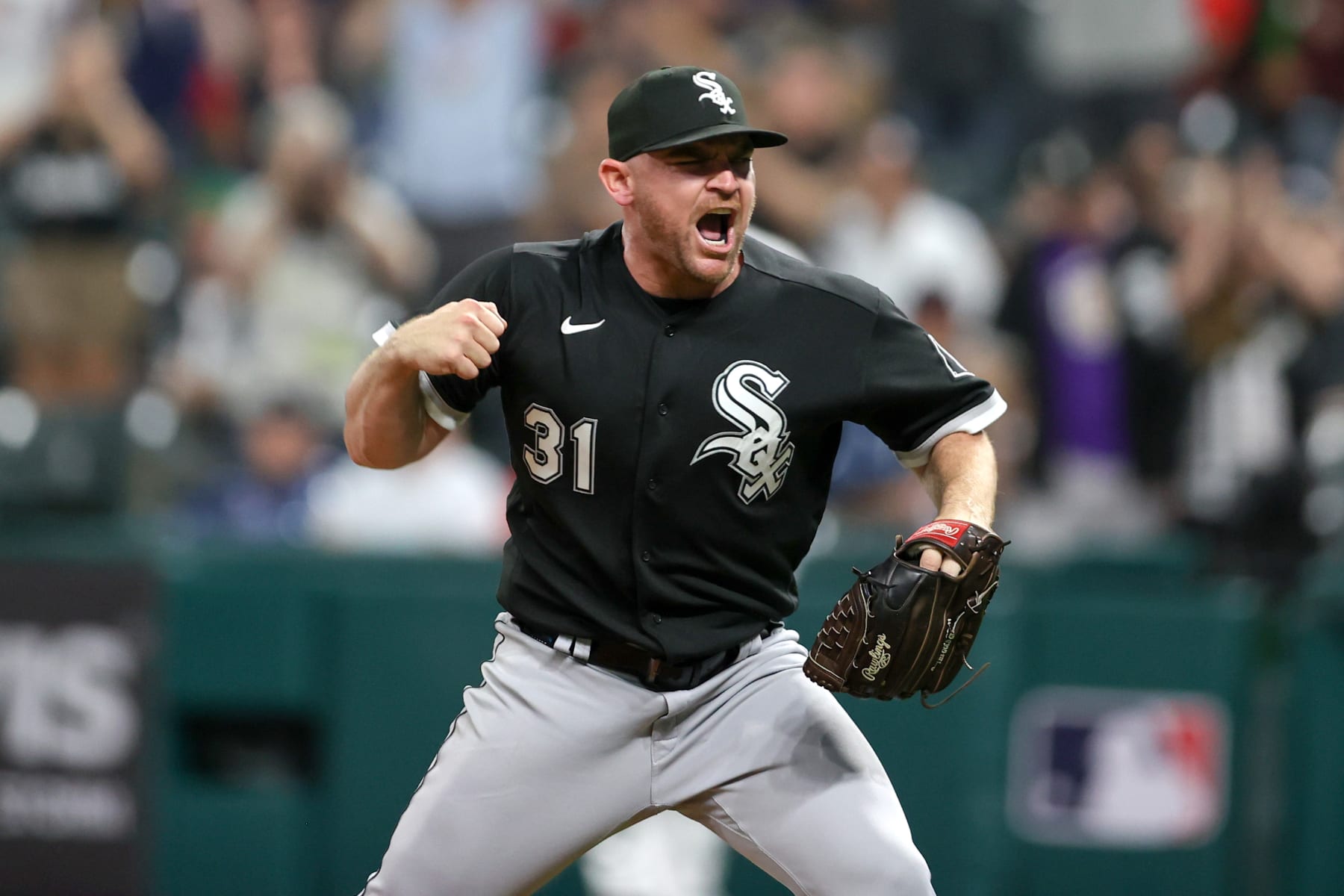 CLEVELAND, OH - AUGUST 20: Chicago White Sox relief pitcher Liam Hendriks (31) reacts after striking out Cleveland Guardians designated hitter Oscar Gonzalez (39) (not pictured) for the final out of the Major League Baseball game between the Chicago White Sox and Cleveland Guardians on August 20, 2022, at Progressive Field in Cleveland, OH. (Photo by Frank Jansky/Icon Sportswire via Getty Images)