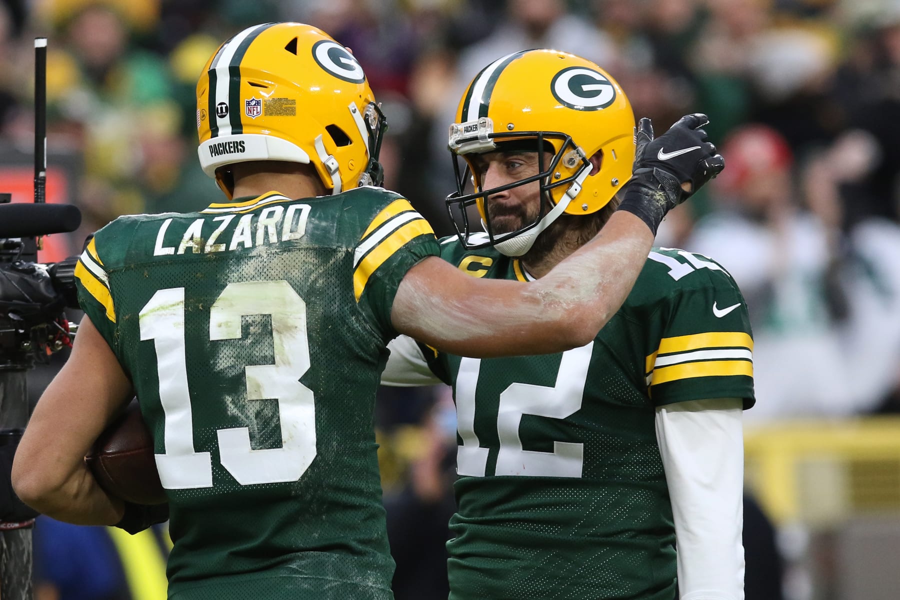 Wide receiver Allen Lazard (left) and quarterback Aaron Rodgers (right)