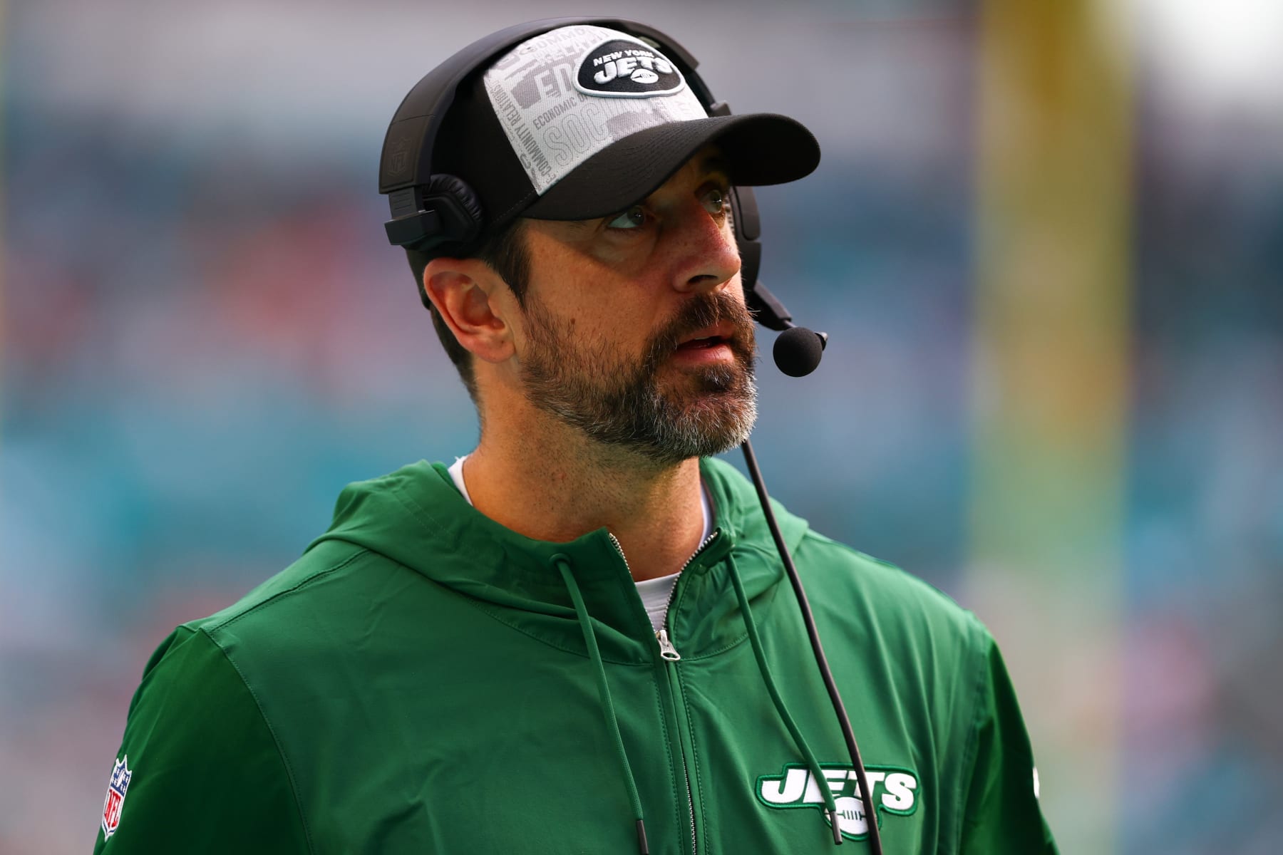 MIAMI GARDENS, FLORIDA - DECEMBER 17: Aaron Rodgers #8 of the New York Jets looks on during the third quarter of the game against the Miami Dolphins at Hard Rock Stadium on December 17, 2023 in Miami Gardens, Florida. (Photo by Megan Briggs/Getty Images)