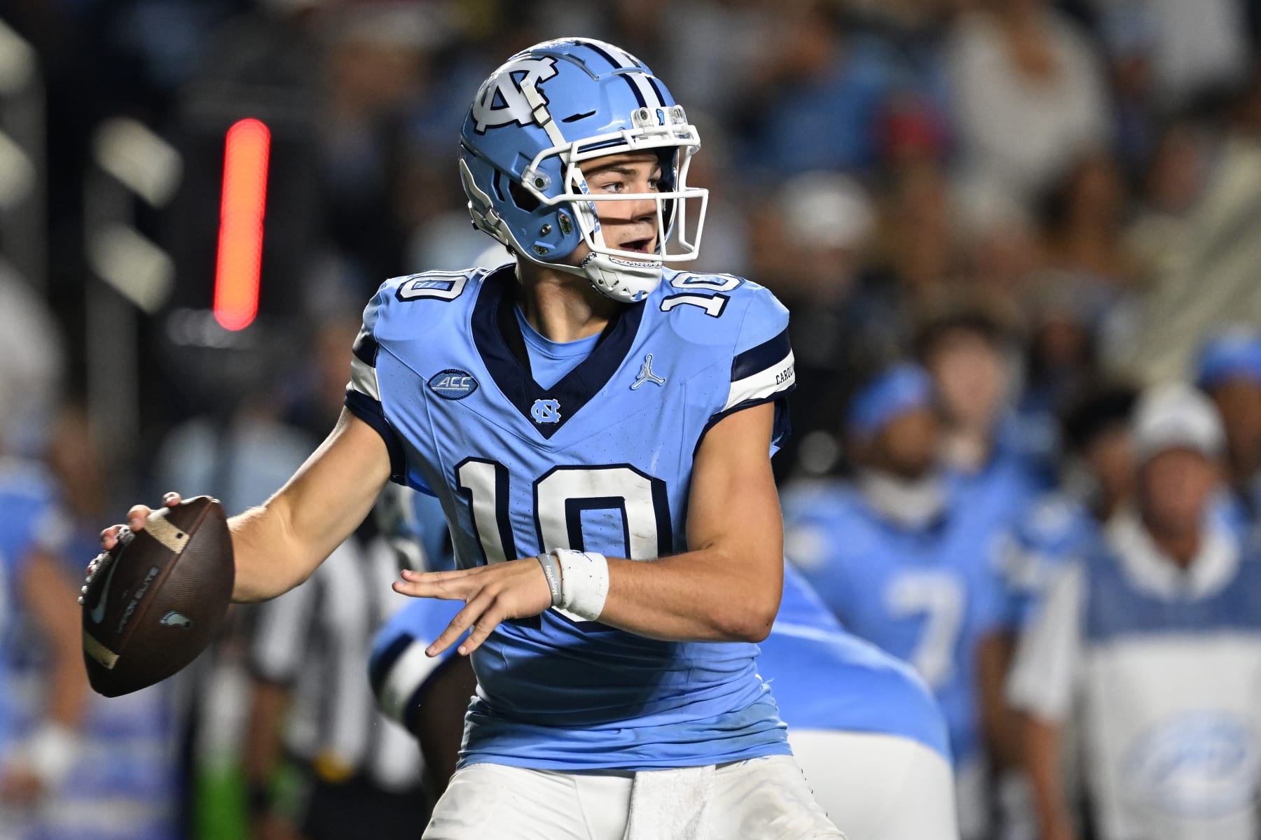CHAPEL HILL, NORTH CAROLINA - OCTOBER 14: Drake Maye #10 of the North Carolina Tar Heels looks to pass against the Miami Hurricanes during their game at Kenan Memorial Stadium on October 14, 2023 in Chapel Hill, North Carolina. The Tar Heels won 41-31. (Photo by Grant Halverson/Getty Images)