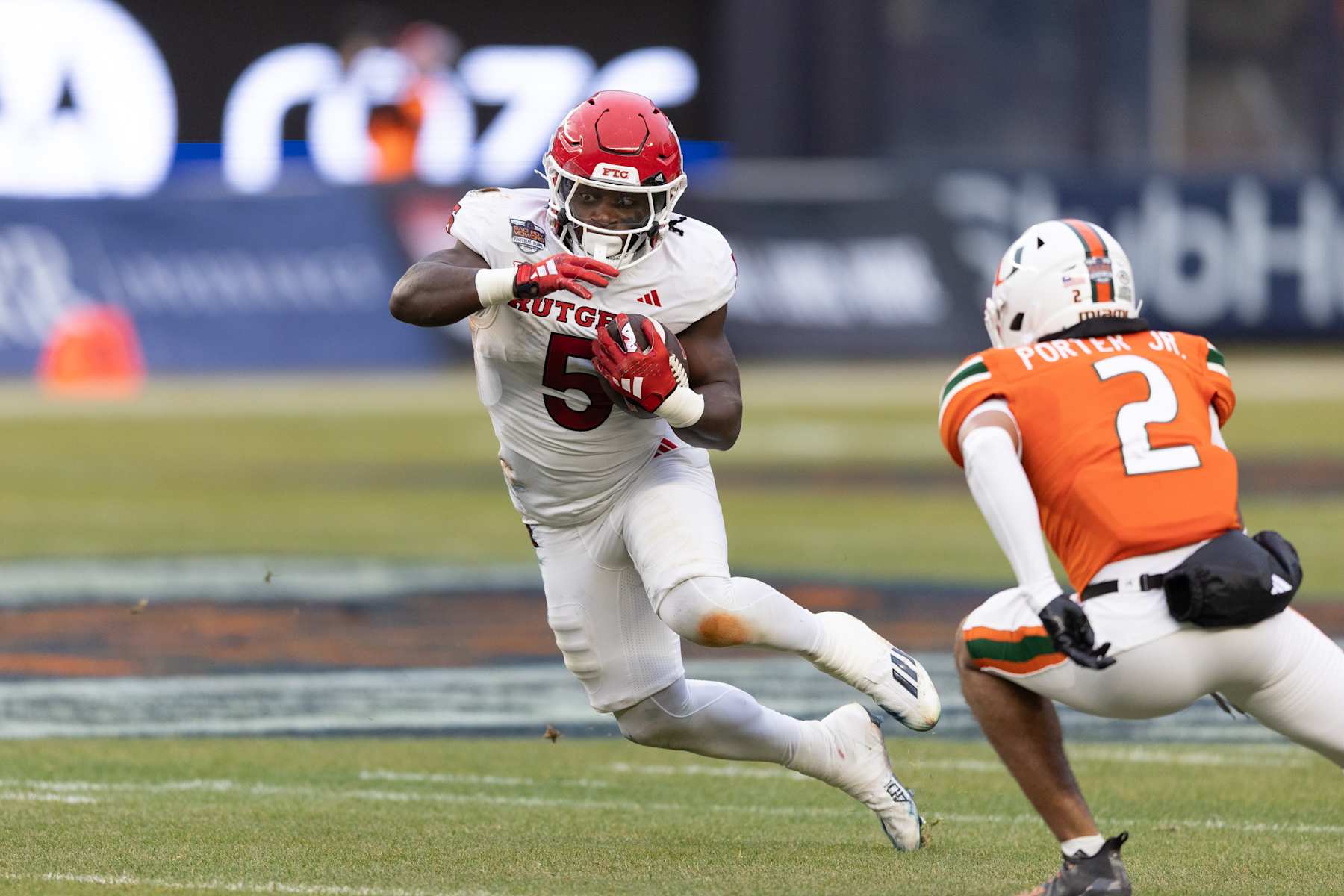 BRONX, NY - DECEMBER 28: Kyle Monangai (5) of the Rutgers Scarlet Knights runs during the first quarter of the Bad Boy Mowers Pinstripe Bowl against the Miami Hurricanes on December 28, 2023 at Yankee Stadium in the Bronx, New York.  (Photo by Rich Graessle/Icon Sportswire via Getty Images)