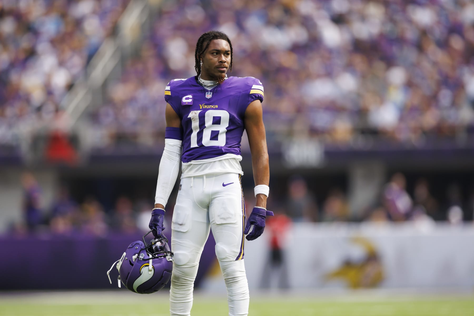 MINNEAPOLIS, MINNESOTA - SEPTEMBER 24: Justin Jefferson #18 of the Minnesota Vikings looks on from the field during an NFL football game against the Los Angeles Chargers at U.S. Bank Stadium on September 24, 2023 in Minneapolis, Minnesota. (Photo by Ryan Kang/Getty Images)