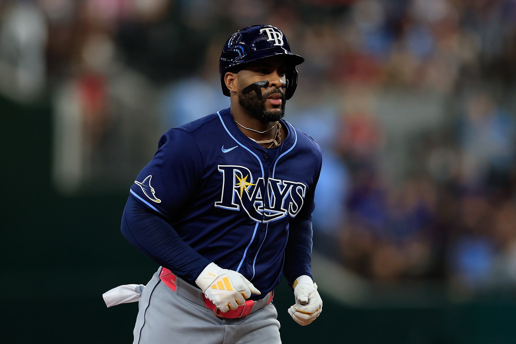 ARLINGTON, TEXAS - JULY 06: Yandy Díaz #2 of the Tampa Bay Rays rounds the bases after hitting a three run home run against the Texas Rangers in the seventh inning at Globe Life Field on July 06, 2024 in Arlington, Texas. (Photo by Buda Mendes/Getty Images)