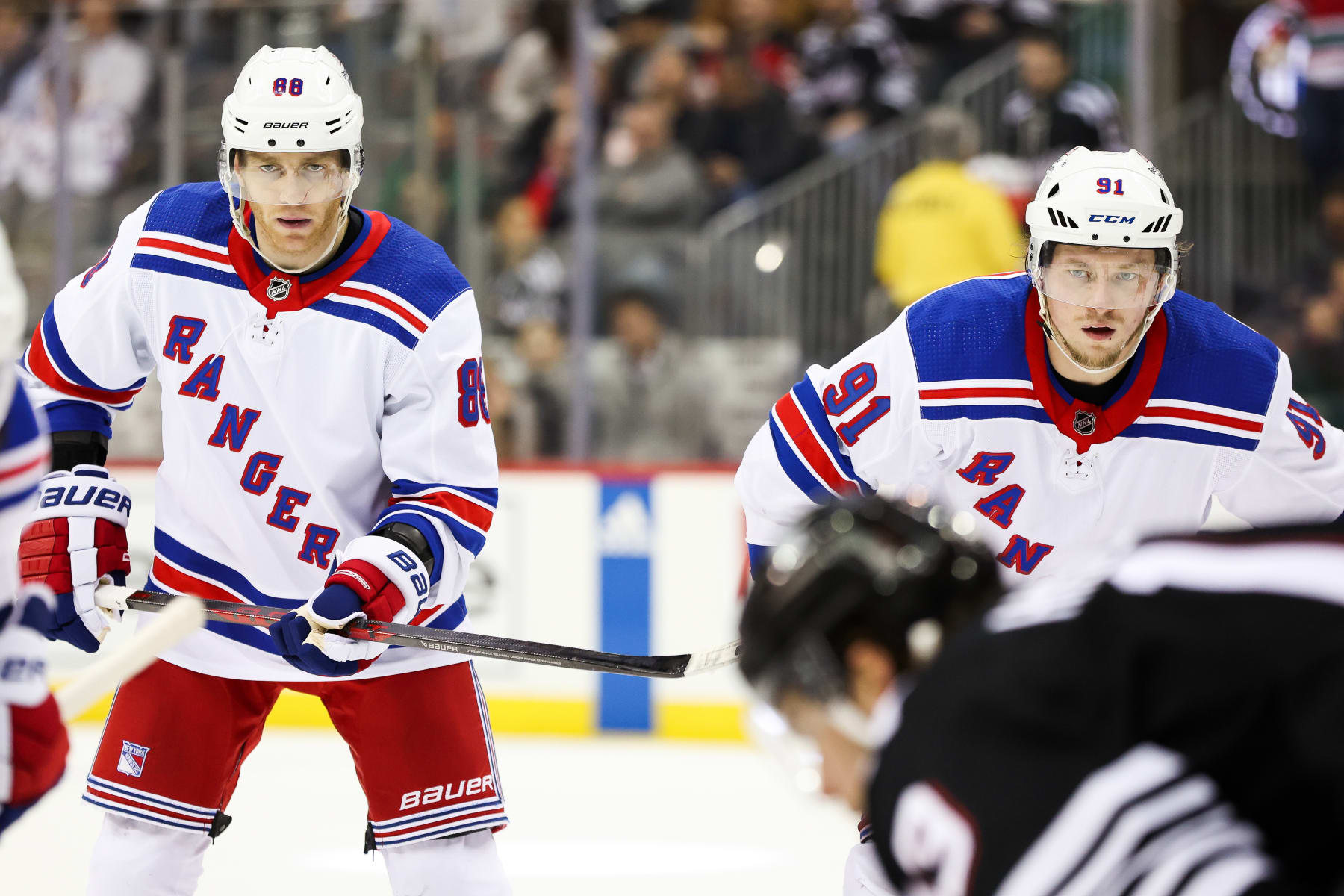 NEWARK, NJ - MARCH 30: New York Rangers right wing Patrick Kane (88) and New York Rangers right wing Vladimir Tarasenko (91) look on during the National Hockey League game between the New York Rangers and the New Jersey Devils on March 30, 2023 at Prudential Center in Newark, NJ. (Photo by Andrew Mordzynski/Icon Sportswire via Getty Images)