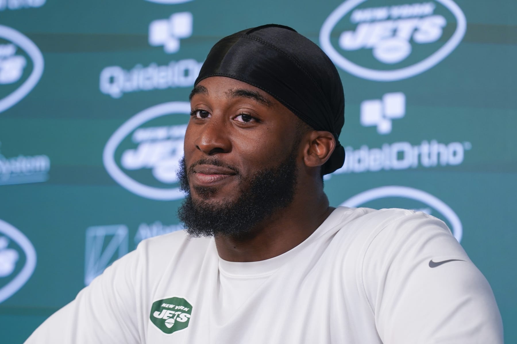 New York Jets' Breece Hall talks to reporters at the NFL football team's training facility in Florham Park, N.J., Wednesday, May 31, 2023. (AP Photo/Seth Wenig)