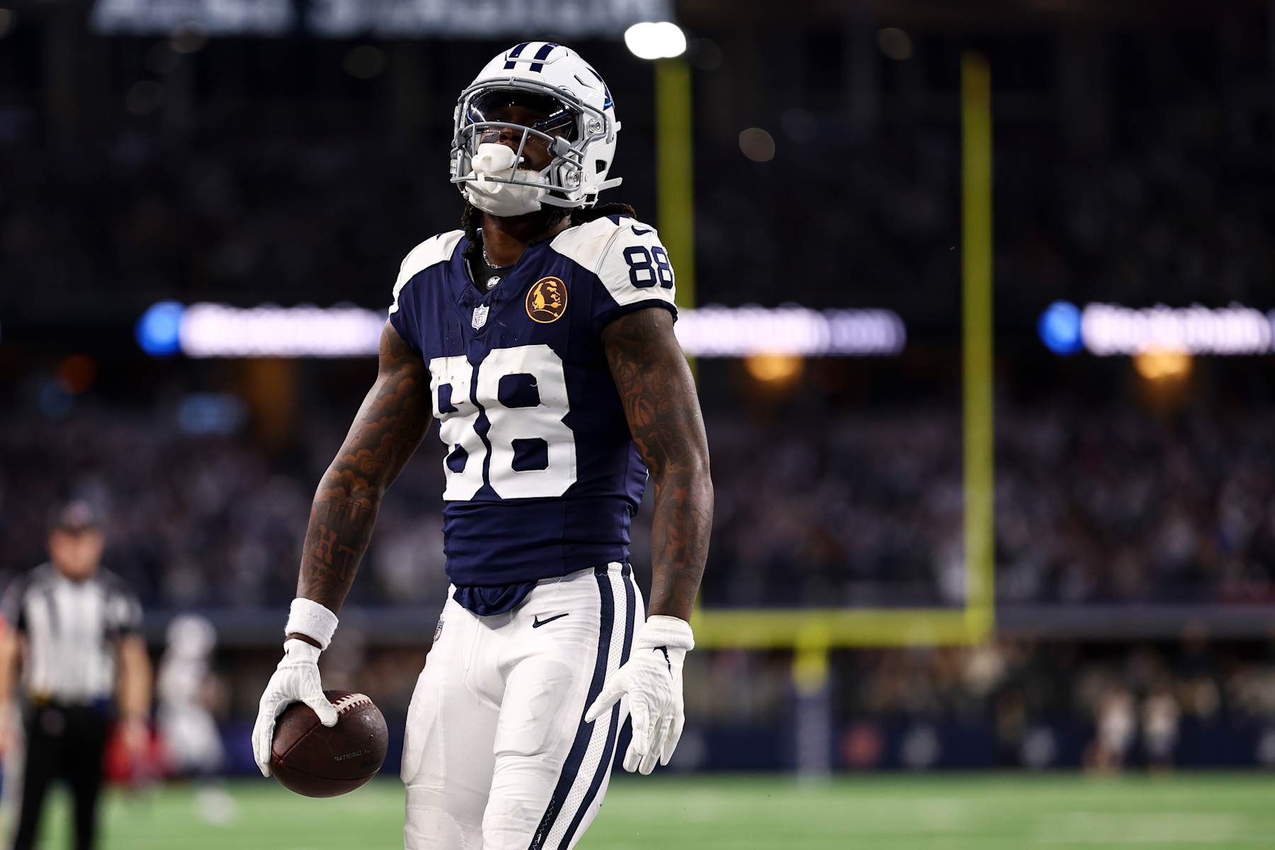 ARLINGTON, TX - NOVEMBER 23: CeeDee Lamb #88 of the Dallas Cowboys celebrates after scoring a touchdown during an NFL football game against the Washington Commanders at AT&T Stadium on November 23, 2023 in Arlington, Texas. (Photo by Kevin Sabitus/Getty Images)