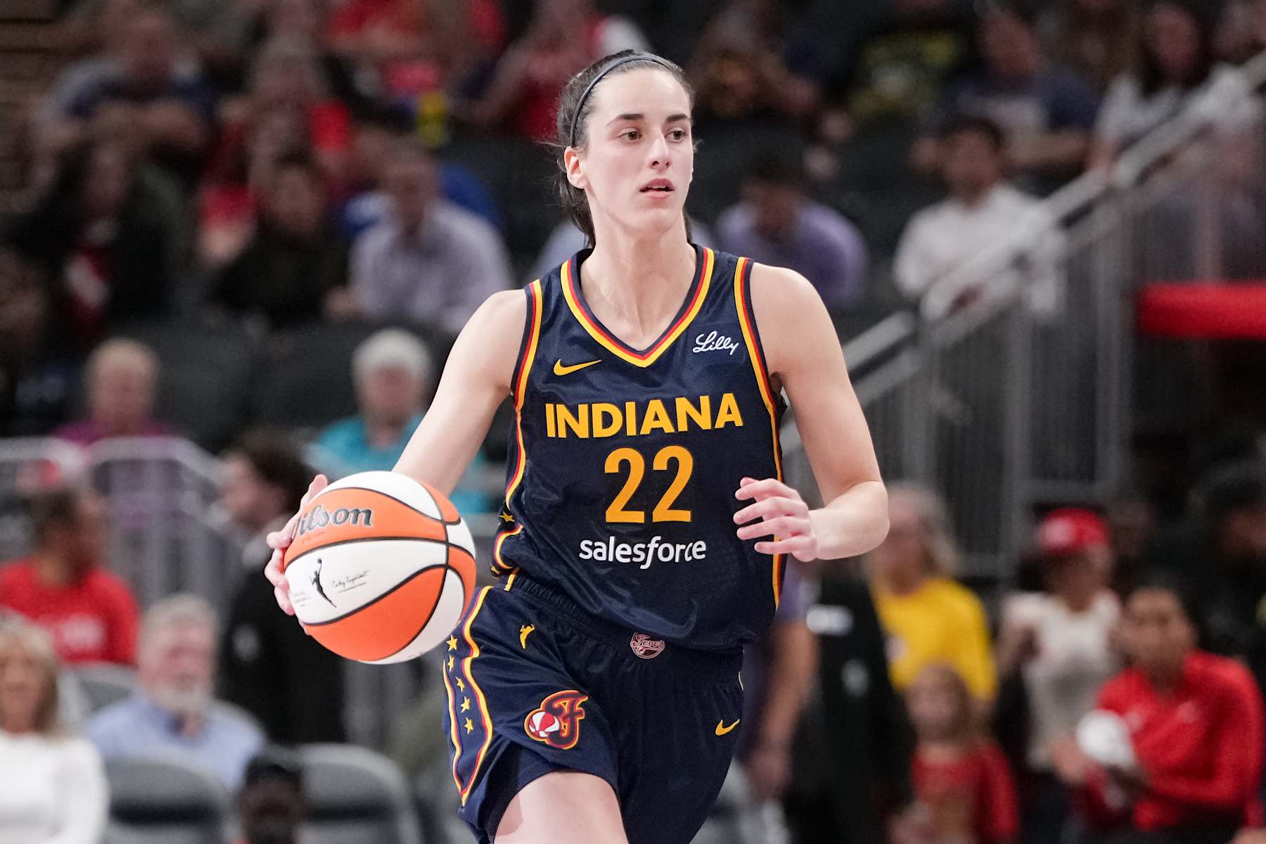INDIANAPOLIS, INDIANA - SEPTEMBER 04: Caitlin Clark #22 of the Indiana Fever dribbles the ball in the third quarter against the Los Angeles Sparks at Gainbridge Fieldhouse on September 04, 2024 in Indianapolis, Indiana. NOTE TO USER: User expressly acknowledges and agrees that, by downloading and or using this photograph, User is consenting to the terms and conditions of the Getty Images License Agreement. (Photo by Dylan Buell/Getty Images)
