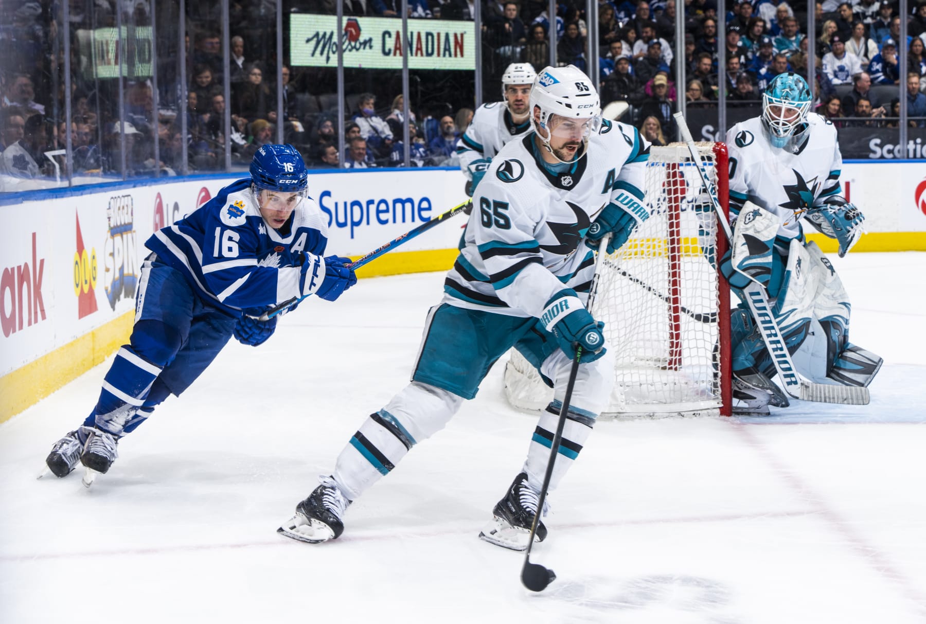 TORONTO, ON - NOVEMBER 30: Erik Karlsson #65 of the San Jose Sharks skates against Mitchell Marner #16 of the Toronto Maple Leafs during the third period at the Scotiabank Arena on November 30, 2022 in Toronto, Ontario, Canada. (Photo by Mark Blinch/NHLI via Getty Images)