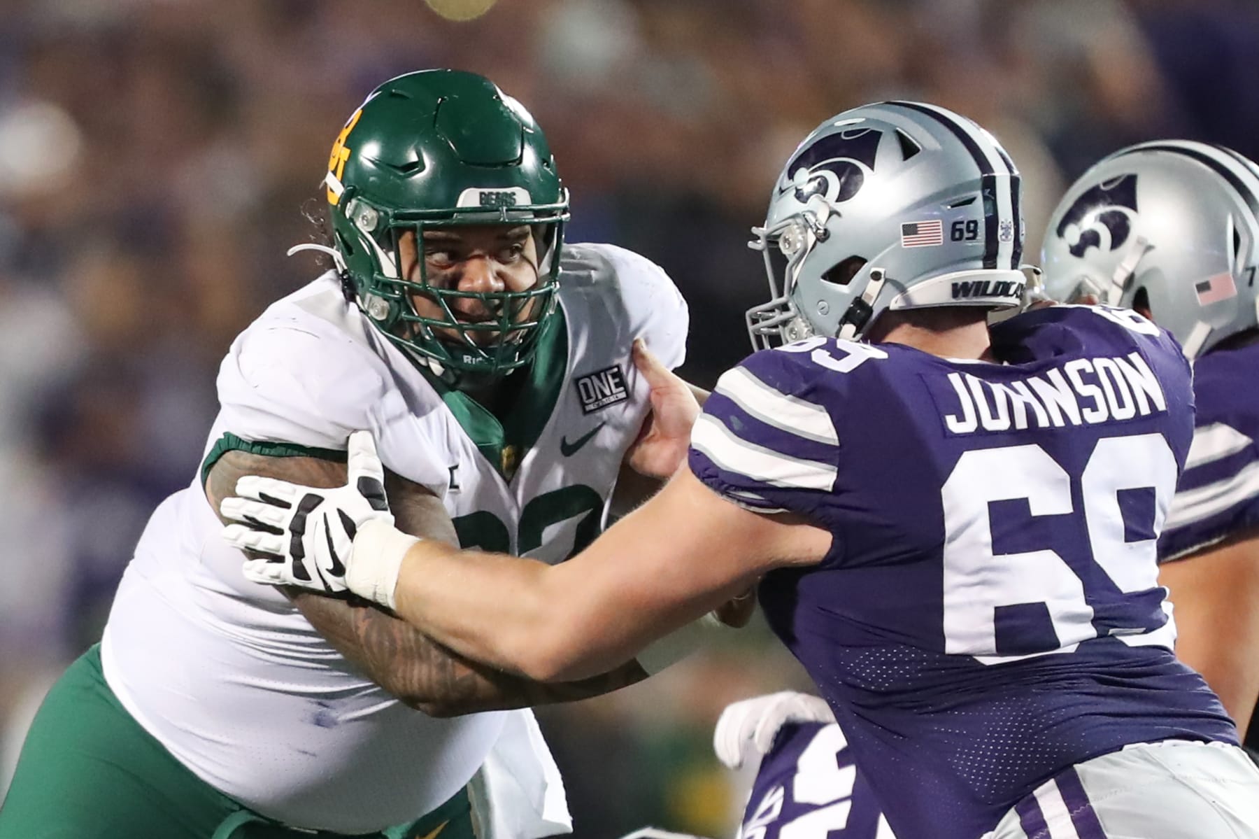 MANHATTAN, KS - NOVEMBER 20: DUPLICATE***Baylor Bears defensive tackle Siaki Ika (62) is blocked by Kansas State Wildcats offensive lineman Noah Johnson (69) in the second quarter of a Big 12 football game between the Baylor Bears and Kansas State Wildcats on Nov 20, 2021 at Bill Snyder Family Stadium in Manhattan, KS. (Photo by Scott Winters/Icon Sportswire via Getty Images)