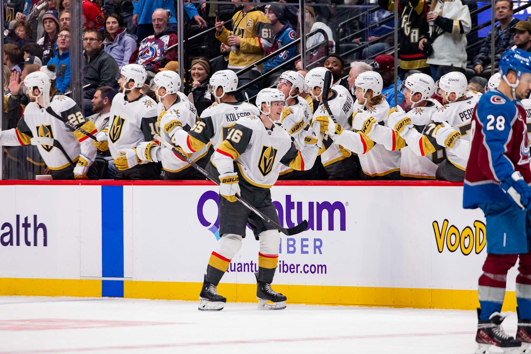 DENVER, COLORADO - NOVEMBER 27: Pavel Dorofeyev #16 of the Vegas Golden Knights high fives his teammates on the bench after scoring a goal in the game against the Colorado Avalanche at Ball Arena on November 27, 2024 in Denver, Colorado. (Photo by Ashley Potts/NHLI via Getty Images)