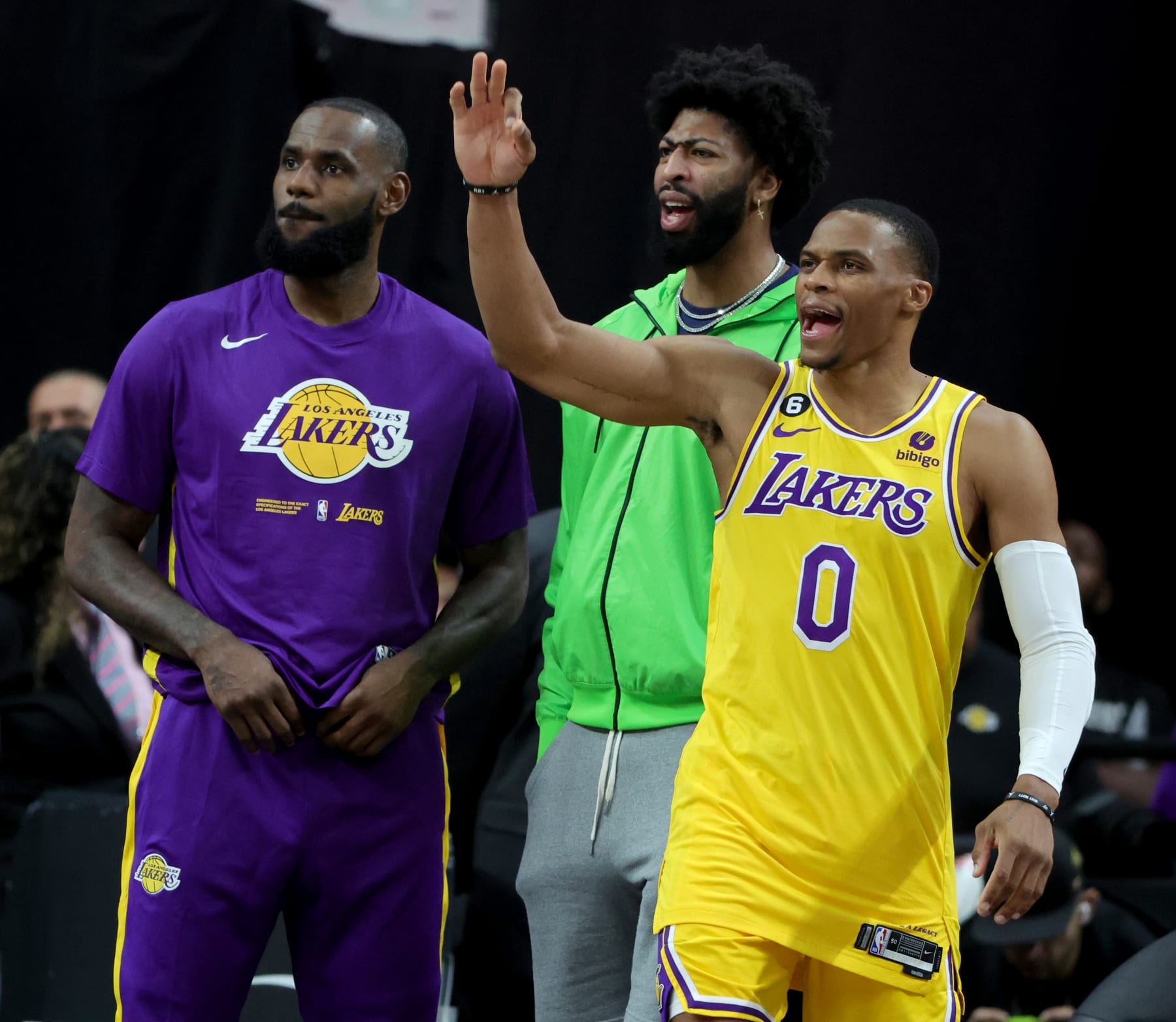 LAS VEGAS, NEVADA - OCTOBER 05: (L-R) LeBron James #6, Anthony Davis #3 and Russell Westbrook #0 of the Los Angeles Lakers react on the sideline in the fourth quarter of their preseason game against the Phoenix Suns at T-Mobile Arena on October 05, 2022 in Las Vegas, Nevada. The Suns defeated the Lakers 119-115. NOTE TO USER: User expressly acknowledges and agrees that, by downloading and or using this photograph, User is consenting to the terms and conditions of the Getty Images License Agreement. (Photo by Ethan Miller/Getty Images)