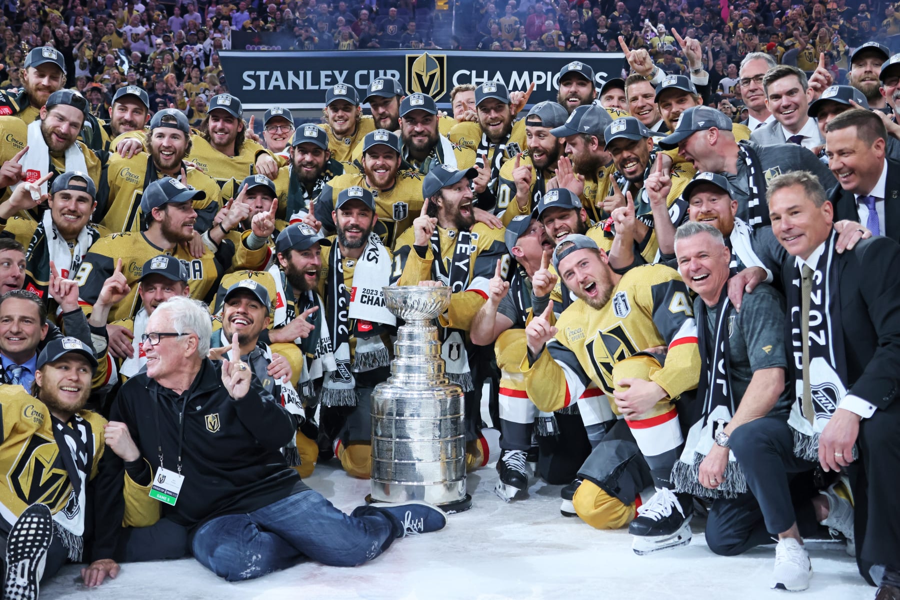LAS VEGAS, NEVADA - JUNE 13: Members of the Vegas Golden Knights pose with the Stanley Cup after defeating the Florida Panthers to win the championship in Game Five of the 2023 NHL Stanley Cup Final at T-Mobile Arena on June 13, 2023 in Las Vegas, Nevada. (Photo by Bruce Bennett/Getty Images)