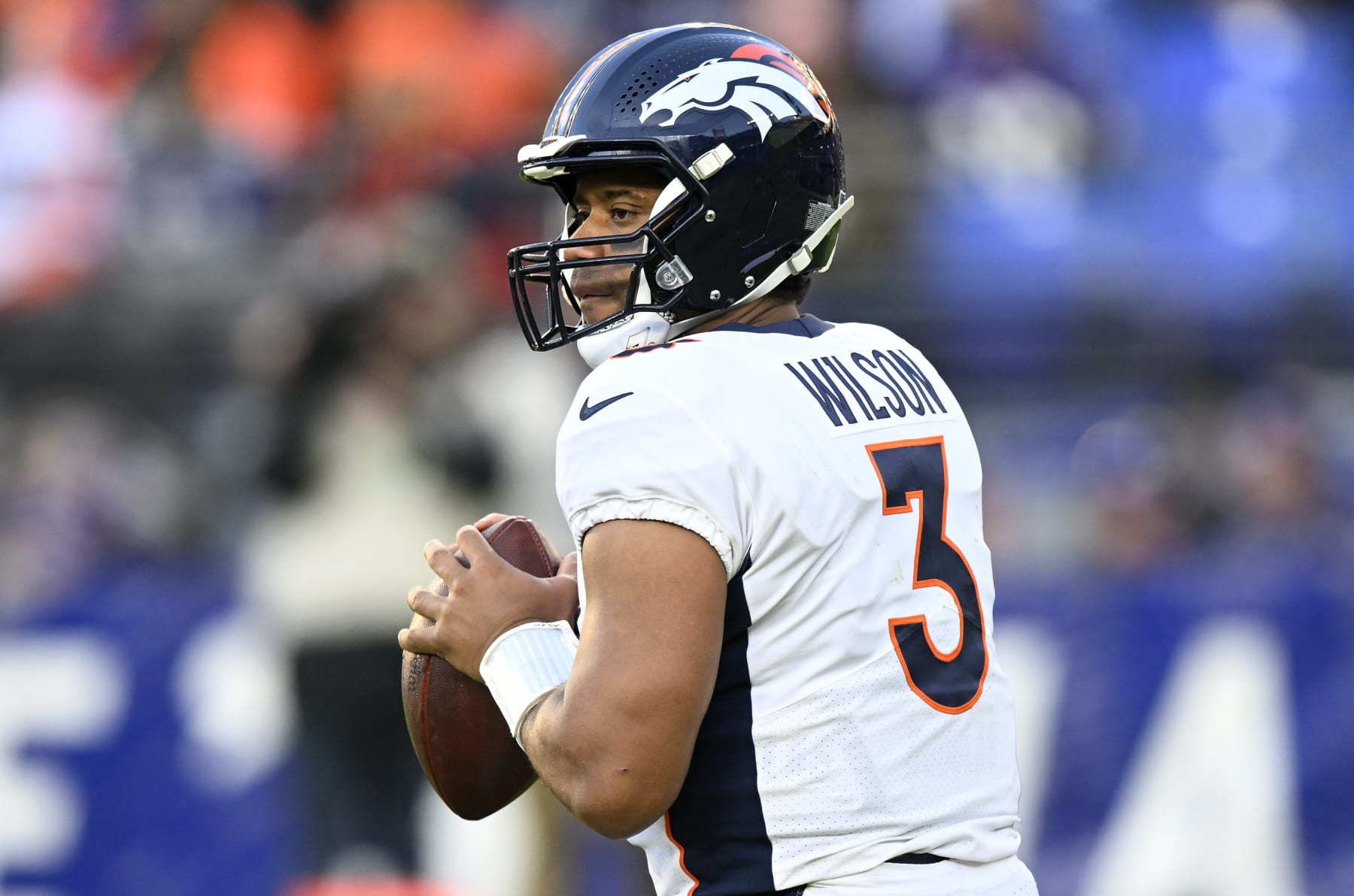 BALTIMORE, MARYLAND - DECEMBER 04: Russell Wilson #3 of the Denver Broncos drops back to pass against the Baltimore Ravens at M&T Bank Stadium on December 04, 2022 in Baltimore, Maryland. (Photo by G Fiume/Getty Images)