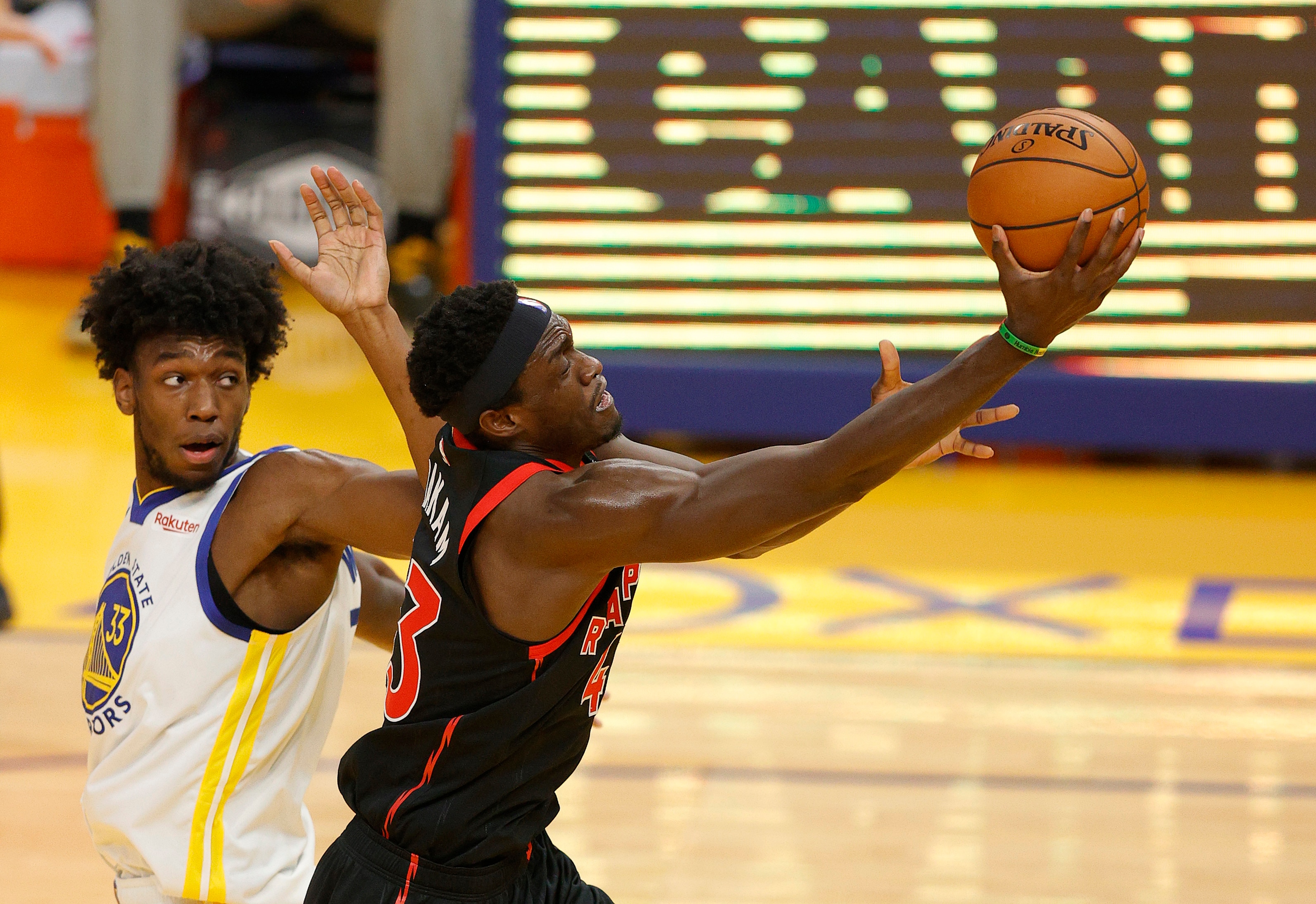 SAN FRANCISCO, CALIFORNIA - JANUARY 10:  Pascal Siakam #43 of the Toronto Raptors goes up for a shot on James Wiseman #33 of the Golden State Warriors at Chase Center on January 10, 2021 in San Francisco, California. NOTE TO USER: User expressly acknowledges and agrees that, by downloading and or using this photograph, User is consenting to the terms and conditions of the Getty Images License Agreement.  (Photo by Ezra Shaw/Getty Images)
