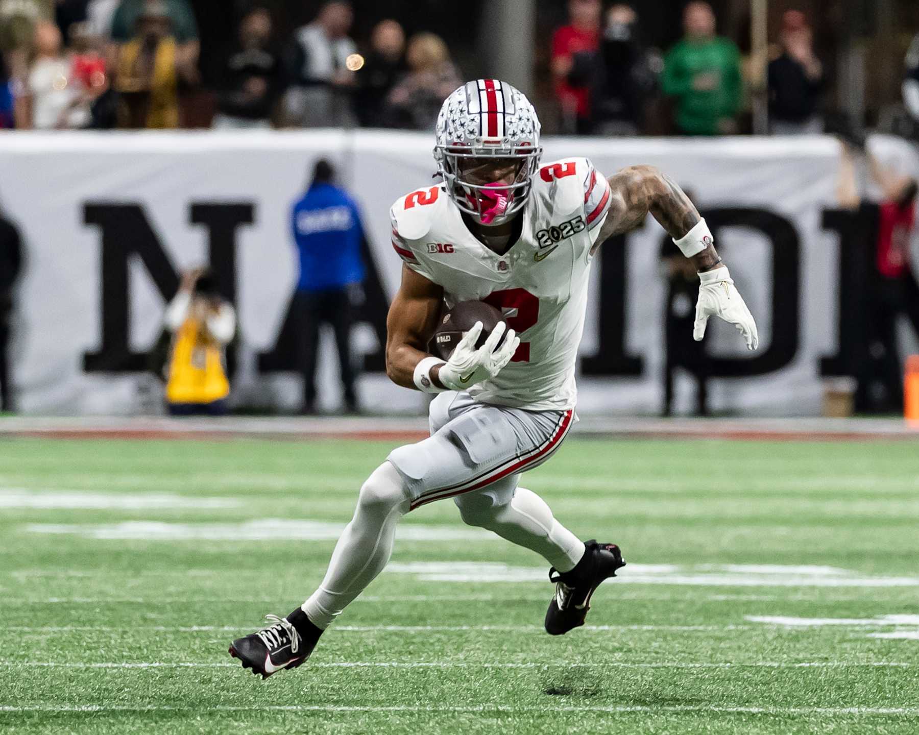ATLANTA, GEORGIA - JANUARY 20: Emeka Egbuka #2 of the Ohio State Buckeyes runs with the ball during a game between the Ohio State Buckeyes and the Notre Dame Fighting Irish at Mercedes-Benz Stadium on January 20, 2025 in Atlanta, Georgia. (Photo by Steve Limentani/ISI Photos/Getty Images)