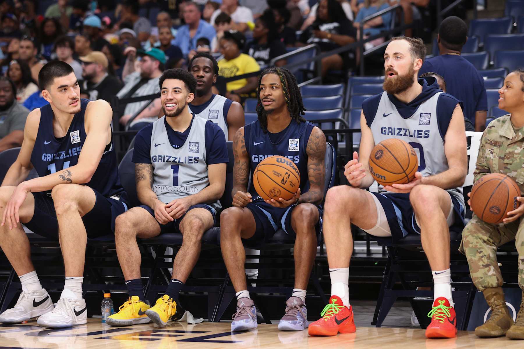 MEMPHIS, TN - OCTOBER 6: Zach Edey #14, Scotty Pippen Jr. #1, Ja Morant #12, and Jay Huff #30 talk during an open practice on October 6, 2024 at FedExForum in Memphis, Tennessee.  NOTE TO USER: User expressly acknowledges and agrees that, by downloading and or using this photograph, User is consenting to the terms and conditions of the Getty Images License Agreement. Mandatory Copyright Notice: Copyright 2024 NBAE (Photo by Joe Murphy/NBAE via Getty Images)