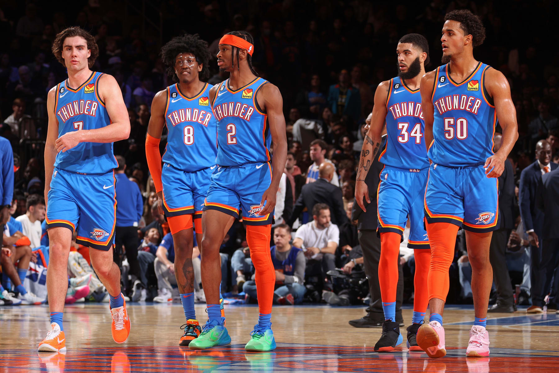 NEW YORK, NY - NOVEMBER 13: Josh Giddey #3, Jalen Williams #8, Shai Gilgeous-Alexander #2, Kenrich Williams #34 and Jeremiah Robinson-Earl #50 of the Oklahoma City Thunder walk on the court against the New York Knicks on November 13, 2022 at Madison Square Garden in New York City, New York.  NOTE TO USER: User expressly acknowledges and agrees that, by downloading and or using this photograph, User is consenting to the terms and conditions of the Getty Images License Agreement. Mandatory Copyright Notice: Copyright 2022 NBAE  (Photo by Nathaniel S. Butler/NBAE via Getty Images)