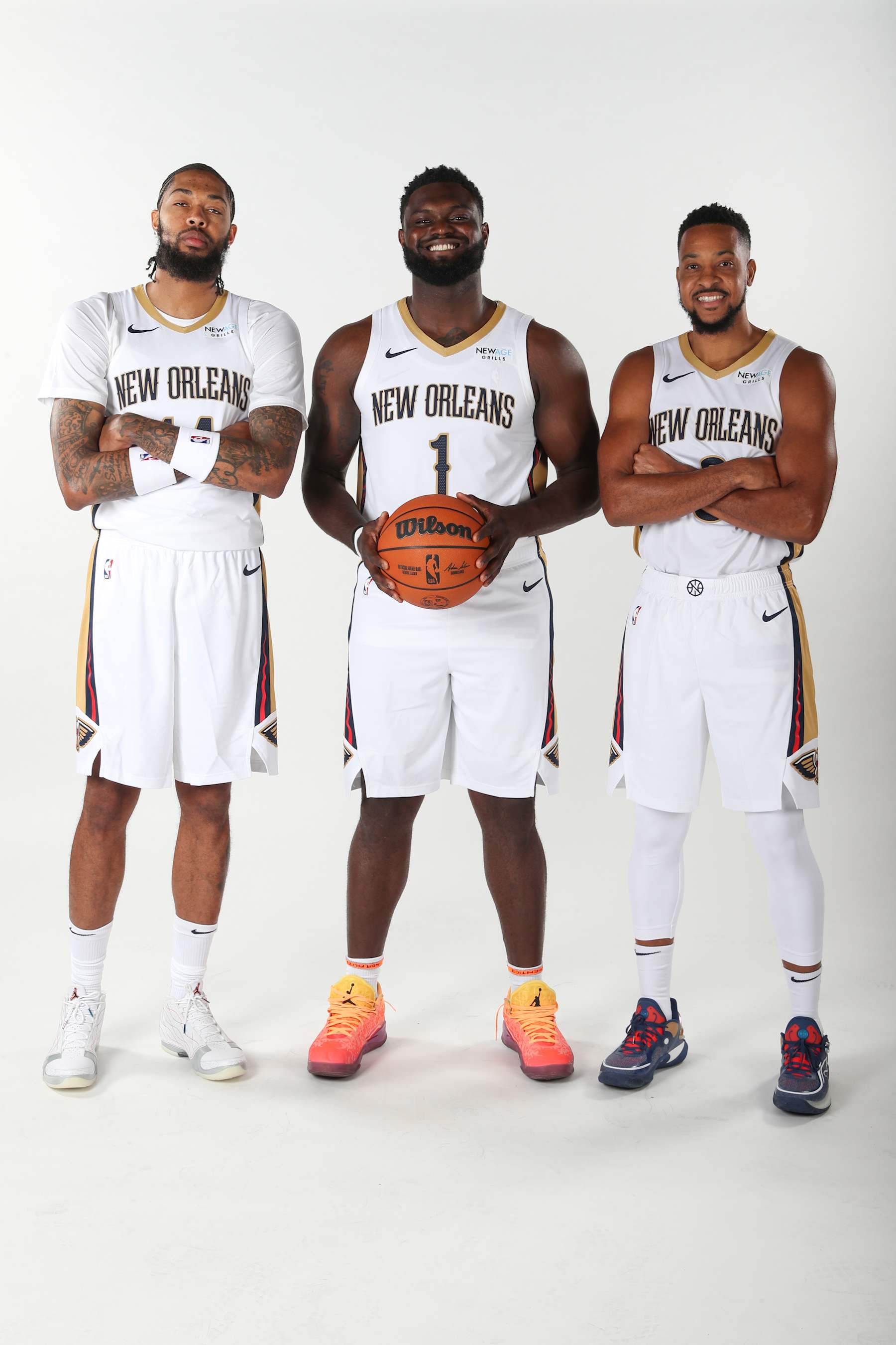 NEW ORLEANS, LA - SEPTEMBER 30: Brandon Ingram #14, Zion Williamson #1, and CJ McCollum of the New Orleans Pelicans poses for a portrait during 2024-25 media day on September 30.2024 in New Orleans, Louisiana at the Smoothie King Center. NOTE TO USER: User expressly acknowledges and agrees that, by downloading and or using this Photograph, user is consenting to the terms and conditions of the Getty Images License Agreement. Mandatory Copyright Notice: Copyright 2024 NBAE (Photo by Layne Murdoch Jr./NBAE via Getty Images)