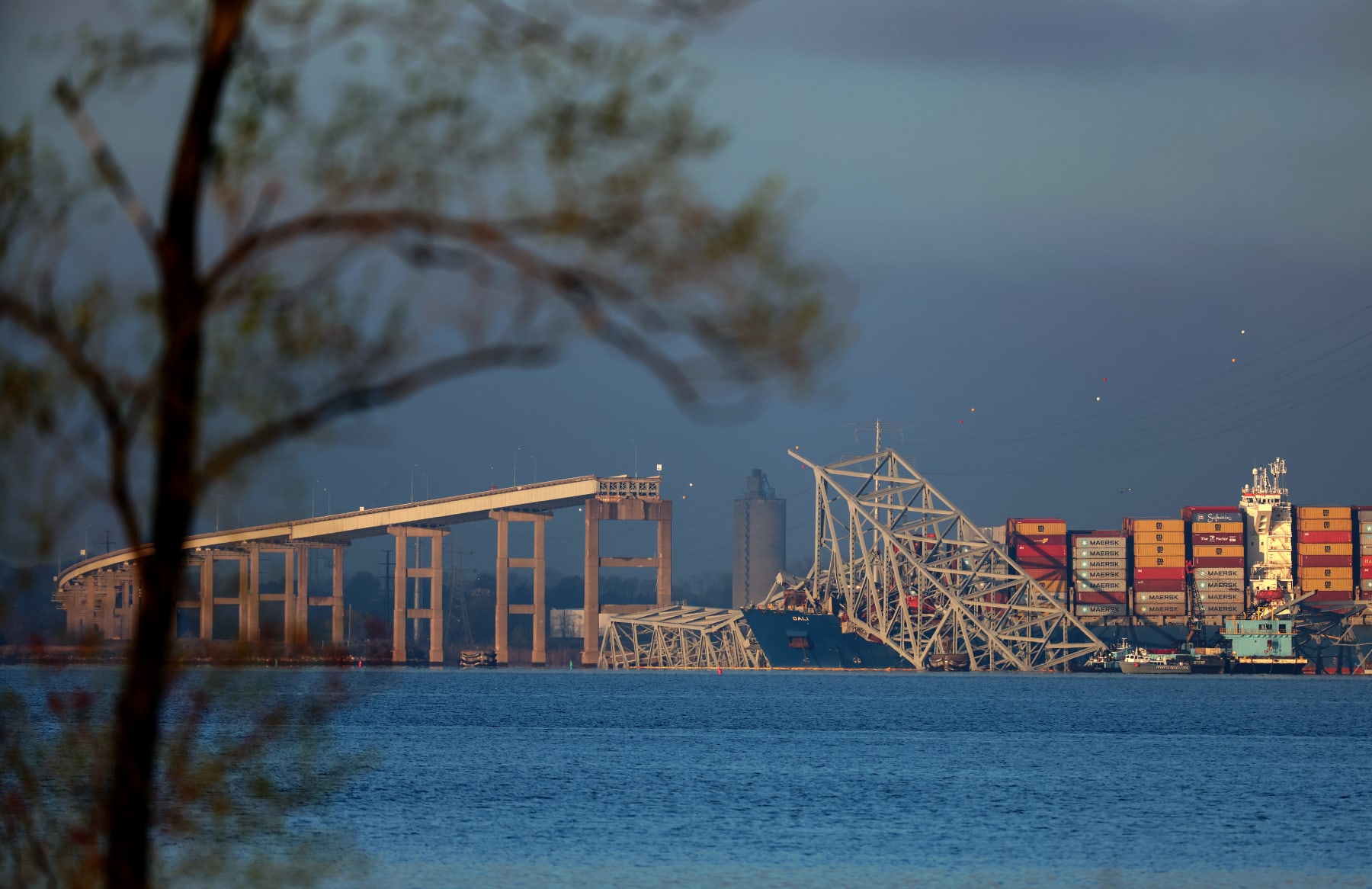 BALTIMORE, MARYLAND - APRIL 04: Salvage personal work to clear debris from the Francis Scott Key Bridge on April 04, 2024 in Baltimore, Maryland. The bridge collapsed on March 26 after being struck by the massive cargo ship Dali. Crews have opened temporary channels allowing limited access to the Port of Baltimore, one of the largest and busiest on the East Coast of the United States. (Photo by Kevin Dietsch/Getty Images)