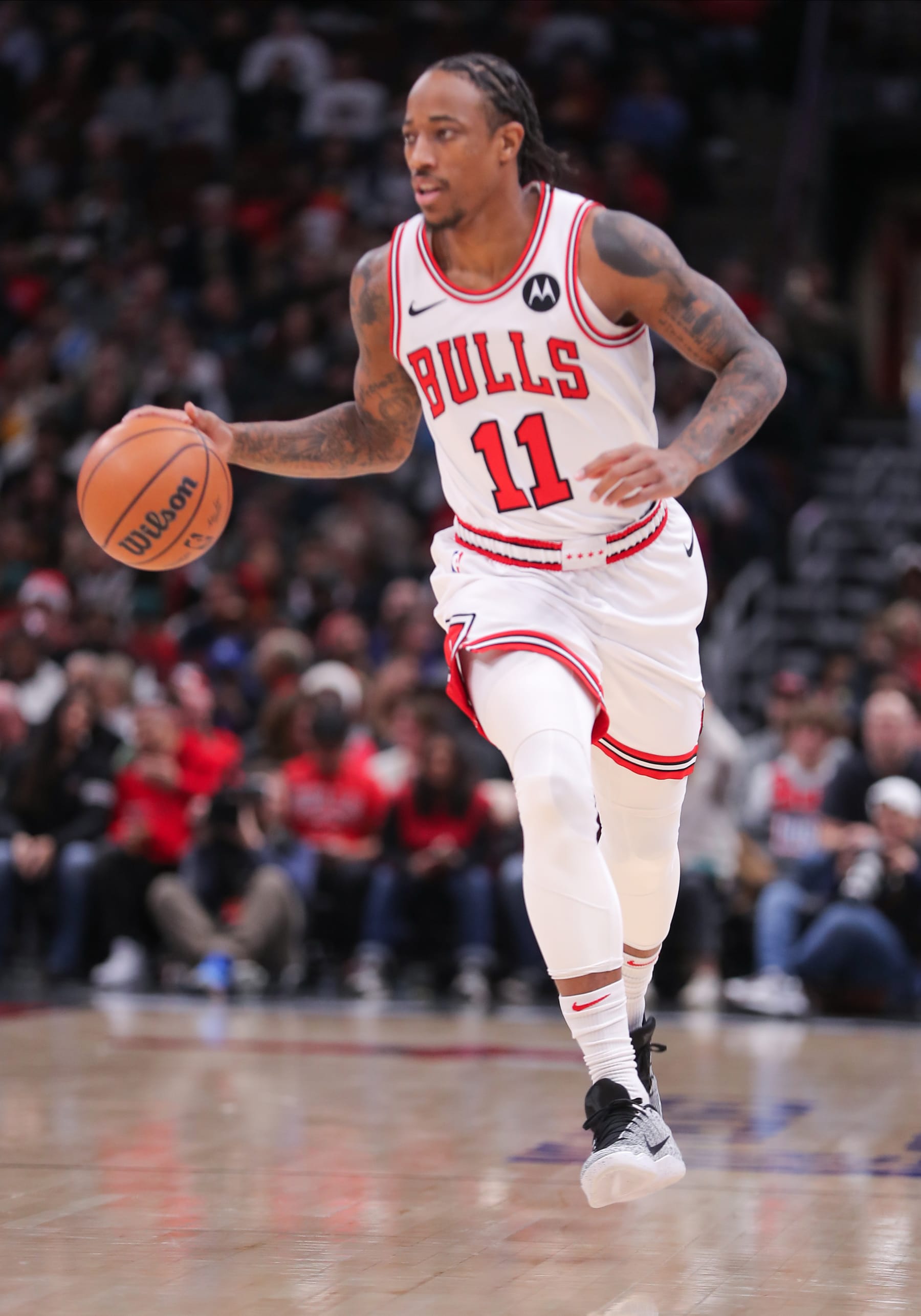 CHICAGO, IL - DECEMBER 12: DeMar DeRozan #11 of the Chicago Bulls brings the ball up court during the first half against the Denver Nuggets at the United Center on December 12, 2023 in Chicago, Illinois. (Photo by Melissa Tamez/Icon Sportswire via Getty Images) CHICAGO, IL - DECEMBER 12: DeMar DeRozan #11 of the Chicago Bulls brings the ball up court during the first half against the Denver Nuggets at the United Center on December 12, 2023 in Chicago, Illinois. (Photo by Melissa Tamez/Icon Sportswire via Getty Images)