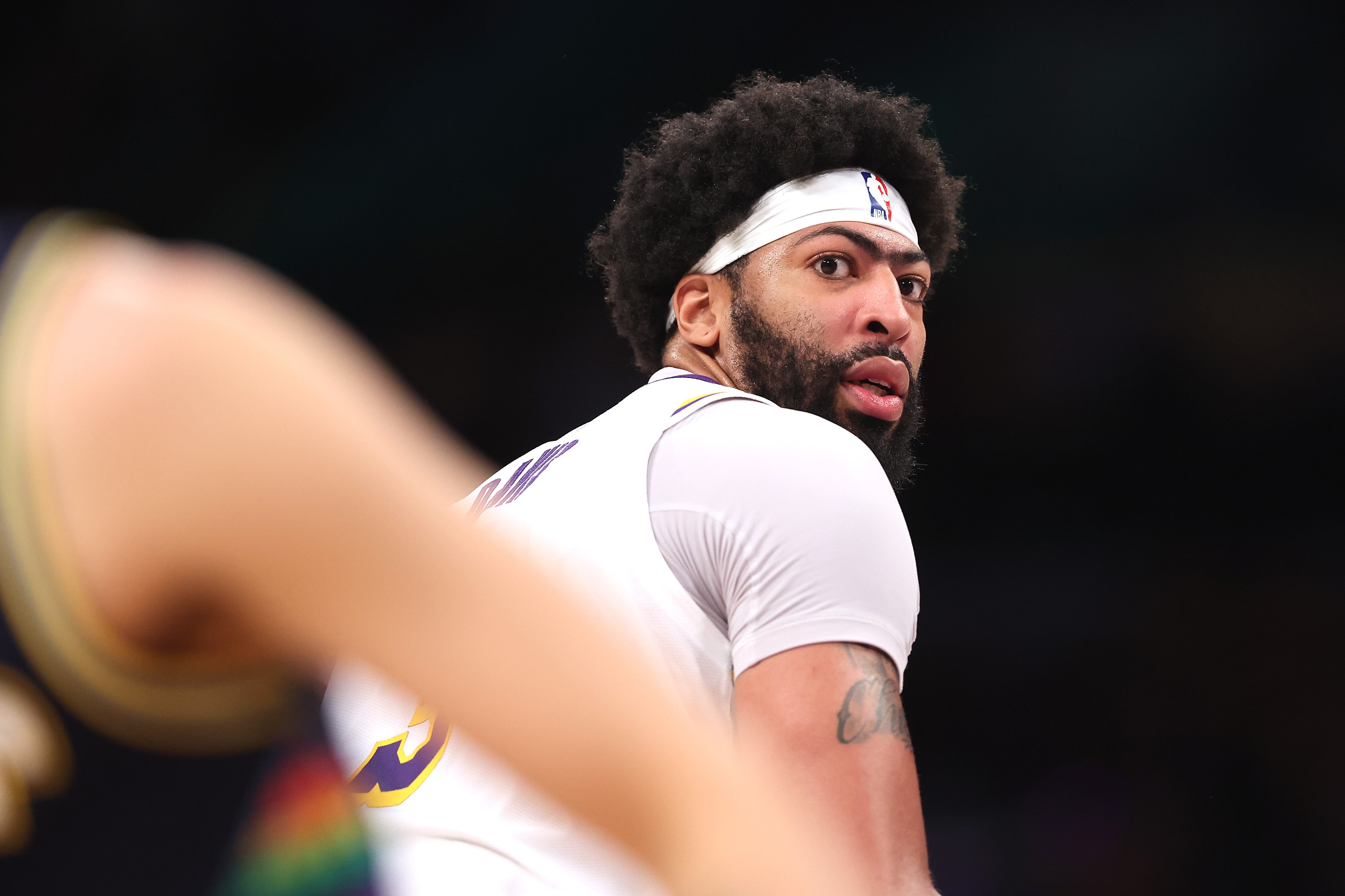 LOS ANGELES, CALIFORNIA - APRIL 03: Anthony Davis #3 of the Los Angeles Lakers looks on after being defeated by the Denver Nuggets 129-118 in a game at Crypto.com Arena on April 03, 2022 in Los Angeles, California. NOTE TO USER: User expressly acknowledges and agrees that, by downloading and/or using this Photograph, user is consenting to the terms and conditions of the Getty Images License Agreement. Mandatory Copyright Notice: Copyright 2022 NBAE (Photo by Sean M. Haffey/Getty Images)