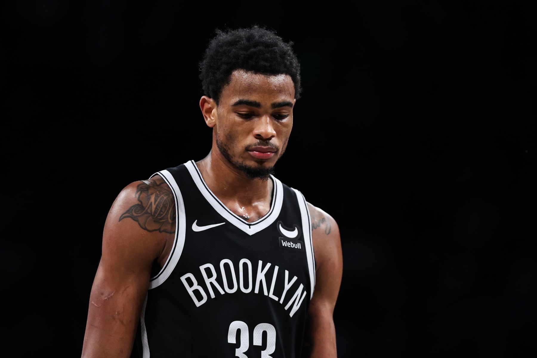 NEW YORK, NEW YORK - JANUARY 23: Nic Claxton #33 of the Brooklyn Nets looks on during the fourth quarter of the game against the New York Knicks at Barclays Center on January 23, 2024 in the Brooklyn borough of New York City.  NOTE TO USER: User expressly acknowledges and agrees that, by downloading and or using this photograph, User is consenting to the terms and conditions of the Getty Images License Agreement. (Photo by Dustin Satloff/Getty Images)