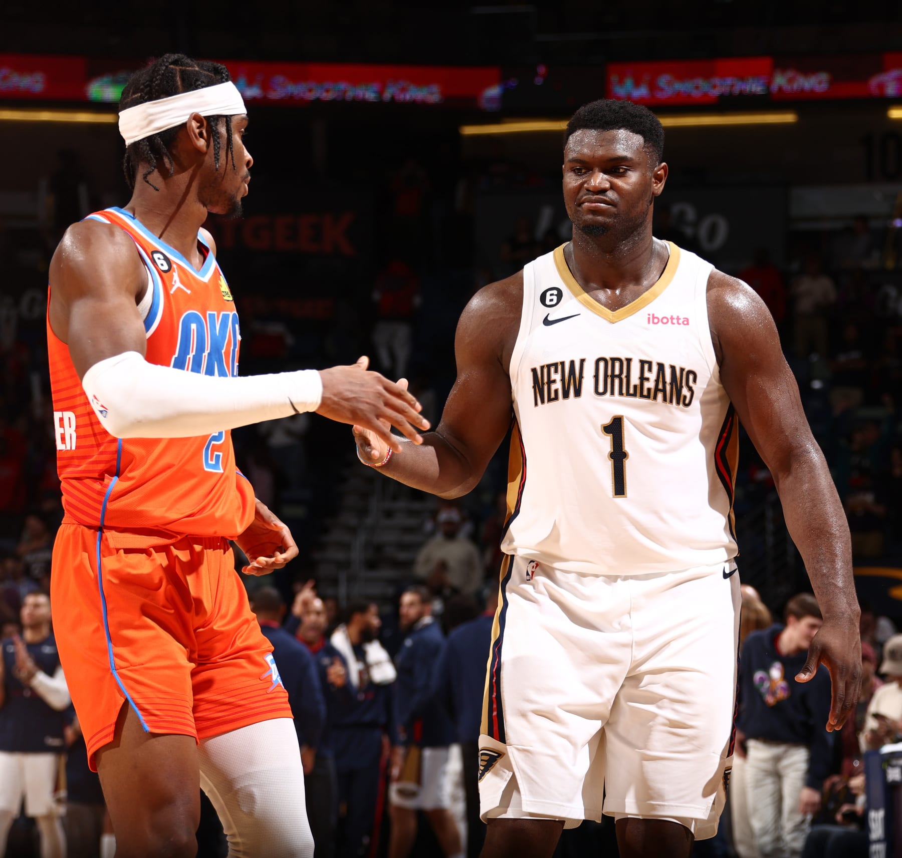 NEW ORLEANS, LA - NOVEMBER 28:  Zion Williamson #1 of the New Orleans Pelicans and Shai Gilgeous-Alexander #2 of the Oklahoma City Thunder after the game on November 28, 2022 at the Smoothie King Center in New Orleans, Louisiana. NOTE TO USER: User expressly acknowledges and agrees that, by downloading and or using this Photograph, user is consenting to the terms and conditions of the Getty Images License Agreement. Mandatory Copyright Notice: Copyright 2022 NBAE (Photo by Ned Dishman/NBAE via Getty Images)