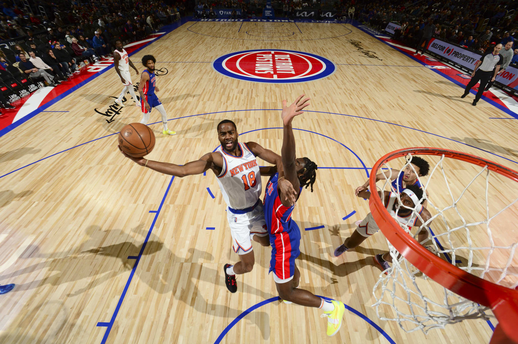 DETROIT, MI - MARCH 27: Alec Burks #18 of the New York Knicks drives to the basket during the game against the Detroit Pistons on March 27, 2022 at Little Caesars Arena in Detroit, Michigan. NOTE TO USER: User expressly acknowledges and agrees that, by downloading and/or using this photograph, User is consenting to the terms and conditions of the Getty Images License Agreement. Mandatory Copyright Notice: Copyright 2022 NBAE (Photo by Chris Schwegler/NBAE via Getty Images)