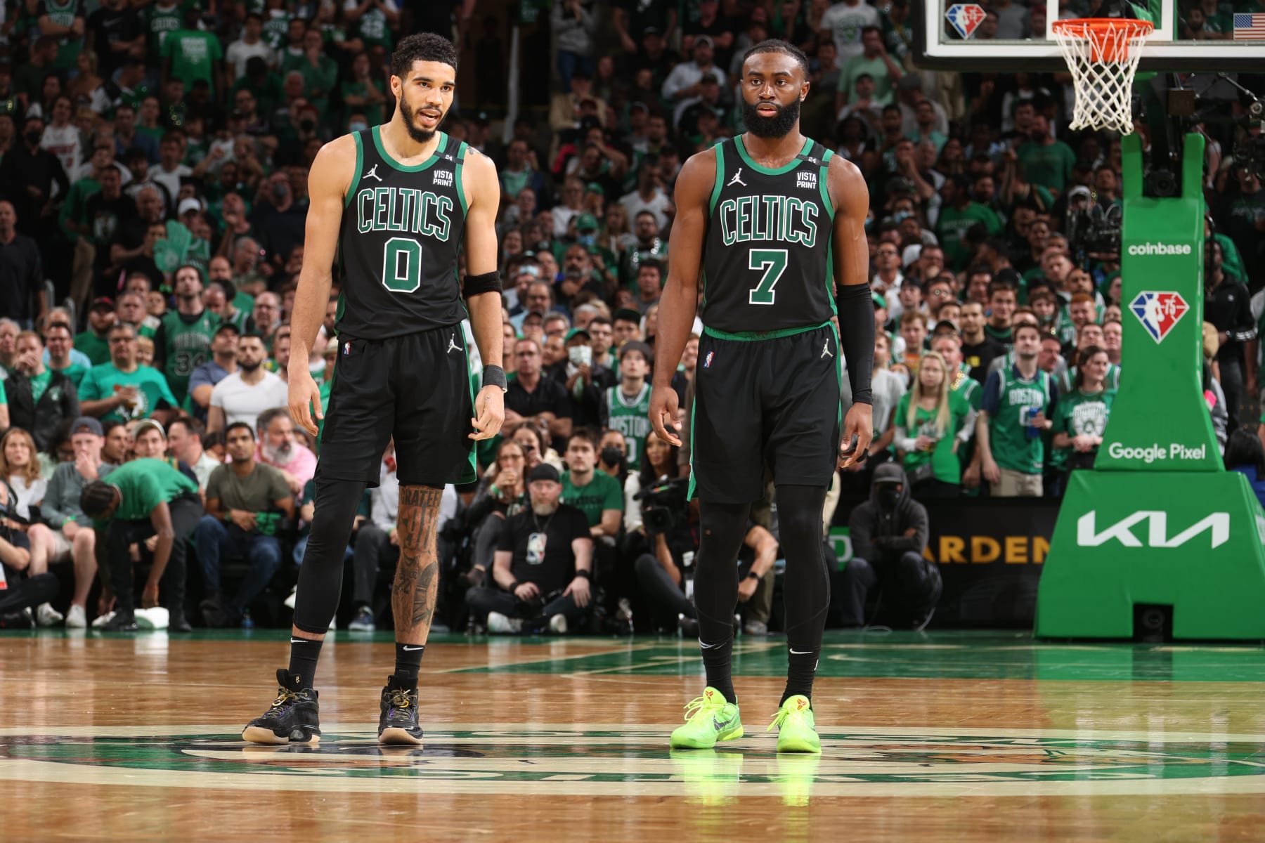BOSTON, MA - MAY 27: Jayson Tatum #0 and Jaylen Brown #7 of the Boston Celtics talk during Game 6 of the 2022 NBA Playoffs Eastern Conference Finals on May 27, 2022 at the TD Garden in Boston, Massachusetts.  NOTE TO USER: User expressly acknowledges and agrees that, by downloading and or using this photograph, User is consenting to the terms and conditions of the Getty Images License Agreement. Mandatory Copyright Notice: Copyright 2022 NBAE  (Photo by Nathaniel S. Butler/NBAE via Getty Images)