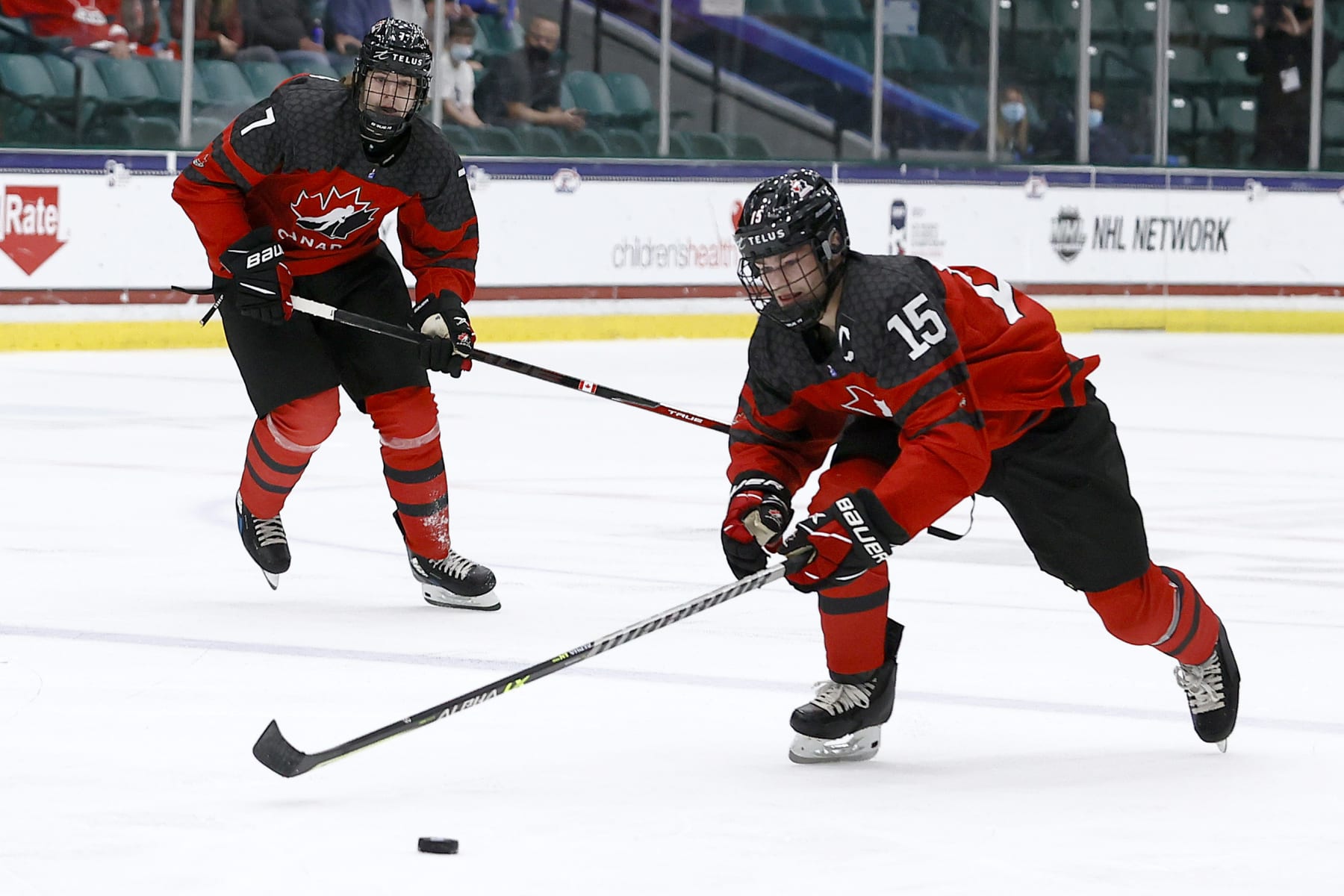 FRISCO, TEXAS - MAY 06: Shane Wright #15 of Canada controls the puck against Russia in the third period during the 2021 IIHF Ice Hockey U18 World Championship Gold Medal Game at Comerica Center on May 06, 2021 in Frisco, Texas. (Photo by Tom Pennington/Getty Images)