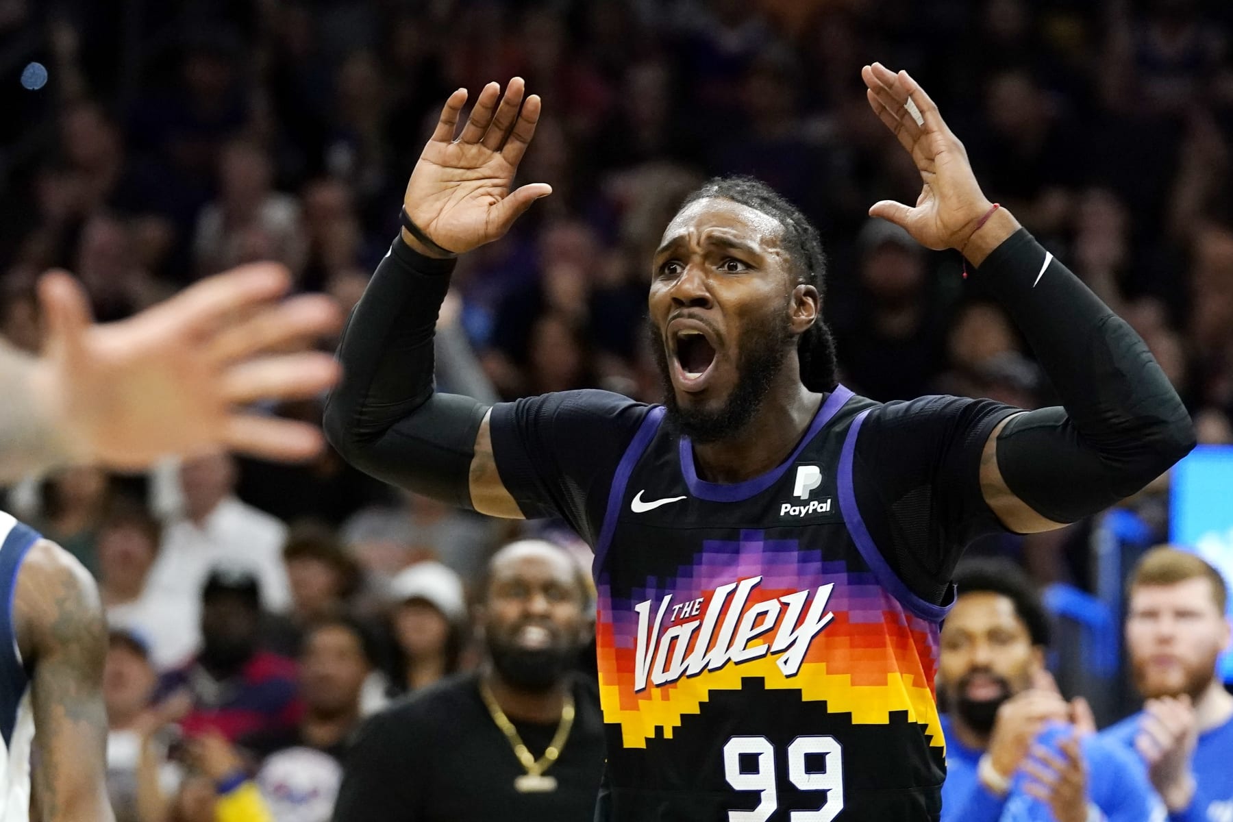 Phoenix Suns forward Jae Crowder argues a foul called against him during the first half of Game 5 of an NBA basketball second-round playoff series against the Dallas Mavericks Tuesday, May 10, 2022, in Phoenix. (AP Photo/Ross D. Franklin)