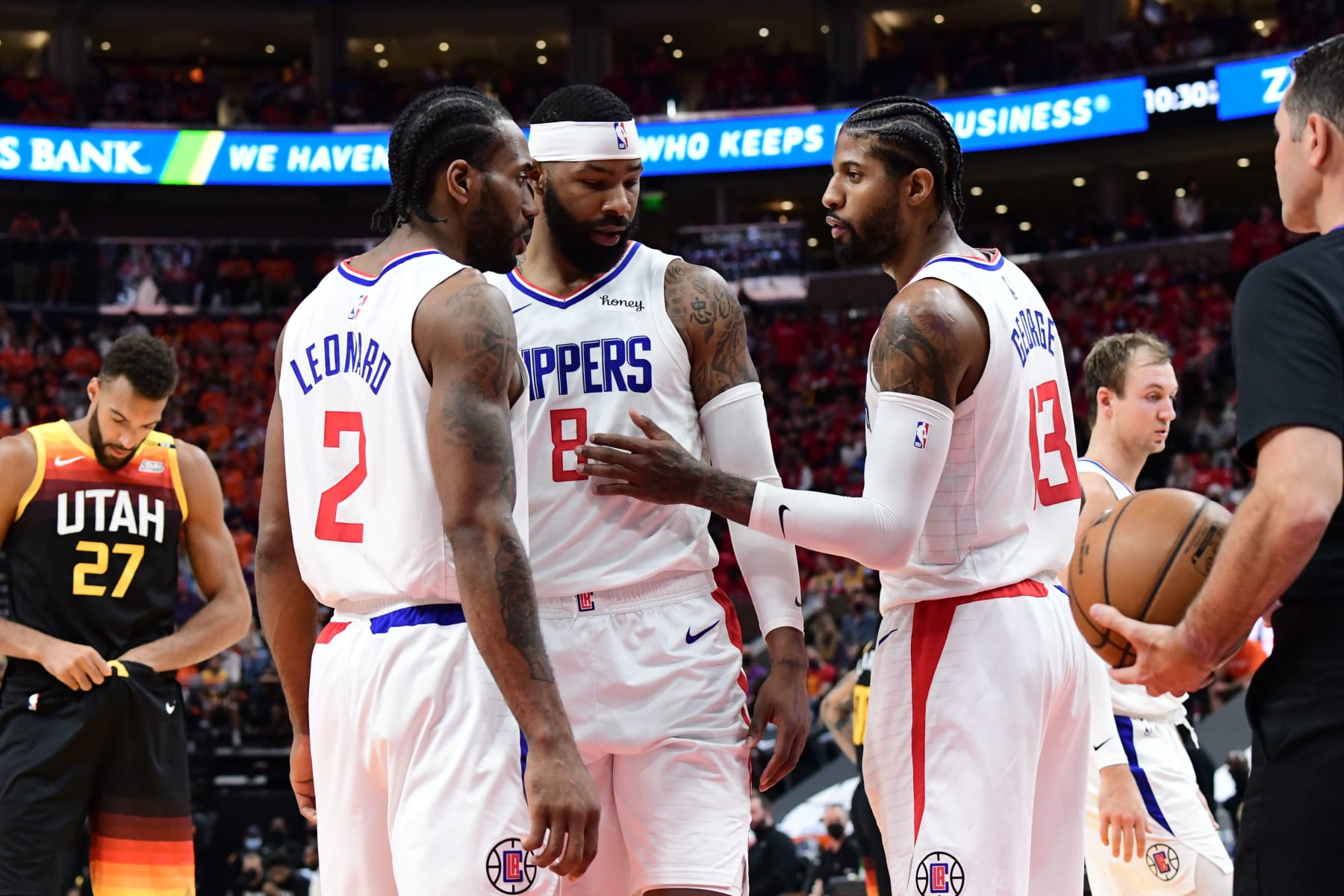SALT LAKE CITY, UT - JUNE 8: Kawhi Leonard #2 and Marcus Morris Sr. #8 talk with Paul George #13 of the LA Clippers during Round 2, Game 1 of the 2021 NBA Playoffs on June 8, 2021 at vivint.SmartHome Arena in Salt Lake City, Utah. NOTE TO USER: User expressly acknowledges and agrees that, by downloading and or using this Photograph, User is consenting to the terms and conditions of the Getty Images License Agreement. Mandatory Copyright Notice: Copyright 2021 NBAE (Photo by Adam Pantozzi/NBAE via Getty Images)