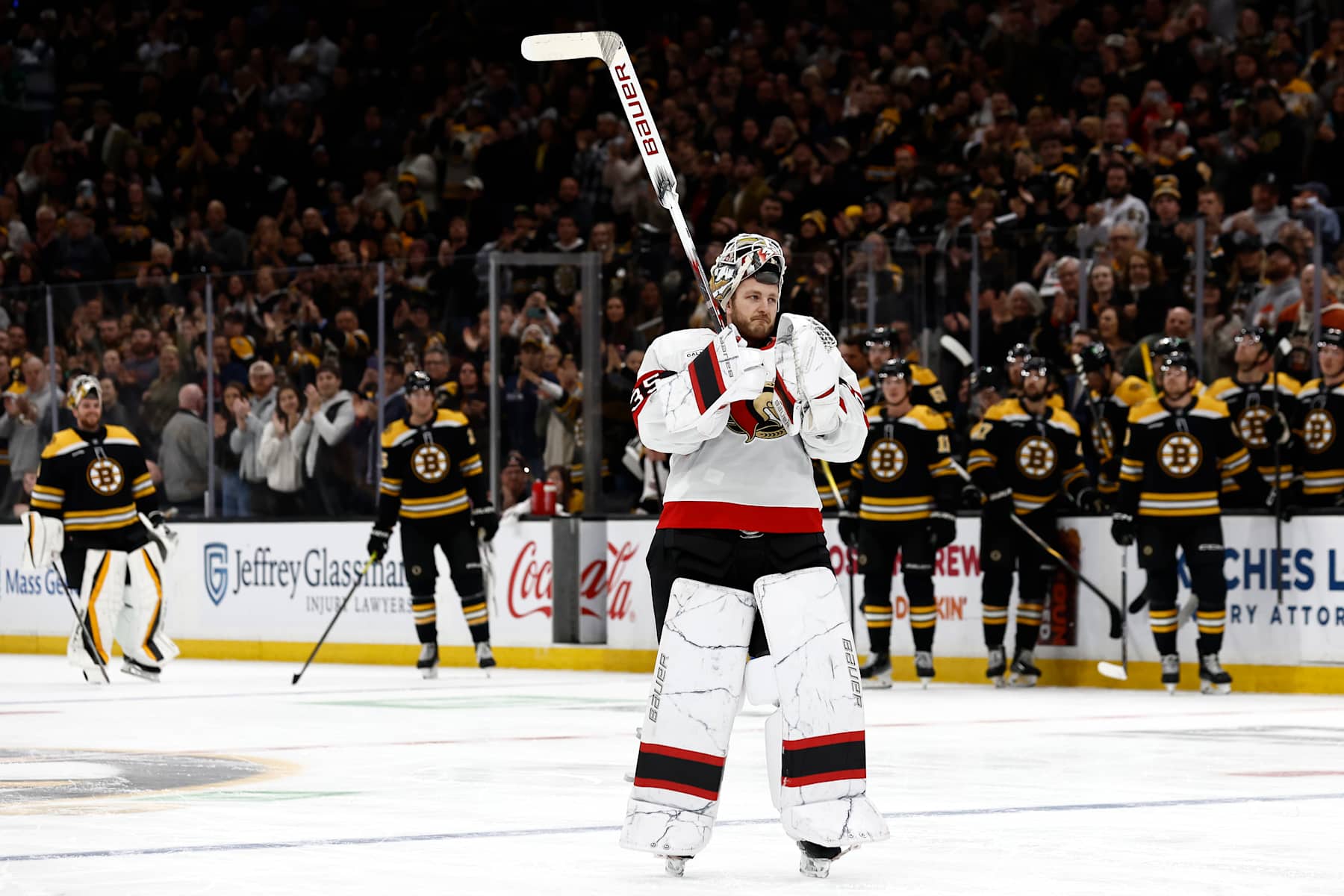 BOSTON, MA - NOVEMBER 09: Goaltender Linus Ullmark #35 of the Ottawa Senators acknowledges the crowd after being honored as his former teammates in the Boston Bruins look onduring a timeout in the first period at TD Garden on November 9, 2024 in Boston, Massachusetts. (Photo By Winslow Townson/Getty Images)