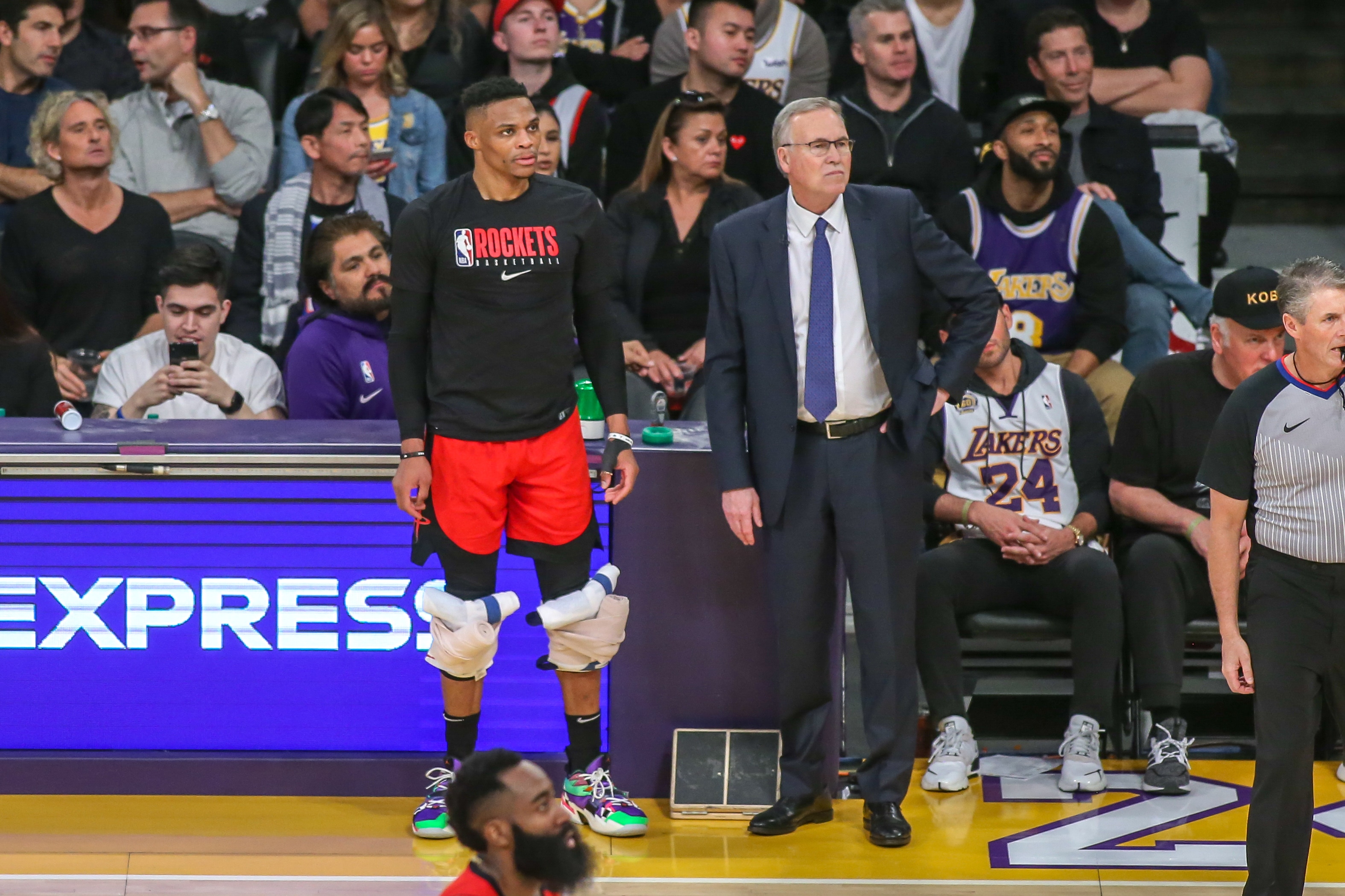 LOS ANGELES, CA - FEBRUARY 06:  Houston Rockets guard Russell Westbrook (0) stands next to Houston Rockets head coach Mike D'Antoni with heat on his knees before returning to the Houston Rockets vs Los Angeles Lakers game on February 06, 2020, at Staples Center in Los Angeles, CA. (Photo by Jevone Moore/Icon Sportswire via Getty Images)
