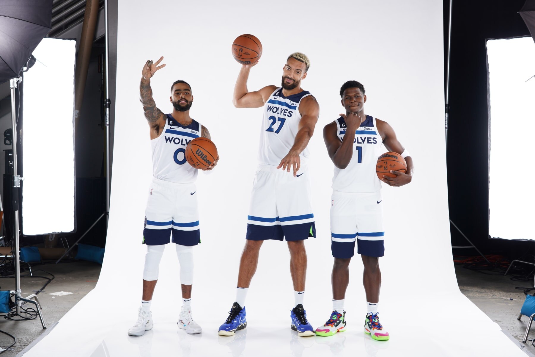 MINNEAPOLIS, MN - SEPTEMBER 26: D'Angelo Russell #0, Rudy Gobert #27, and Anthony Edwards #1 of the Minnesota Timberwolves pose for a portrait during 2022 Media Day on September 26, 2022 at Target Center in Minneapolis, Minnesota.  NOTE TO USER:  User expressly acknowledges and agrees that, by downloading and or using this Photograph, user is consenting to the terms and conditions of the Getty Images License Agreement. Mandatory Copyright Notice: Copyright 2022 NBAE (Photo by Jordan Johnson/NBAE via Getty Images)