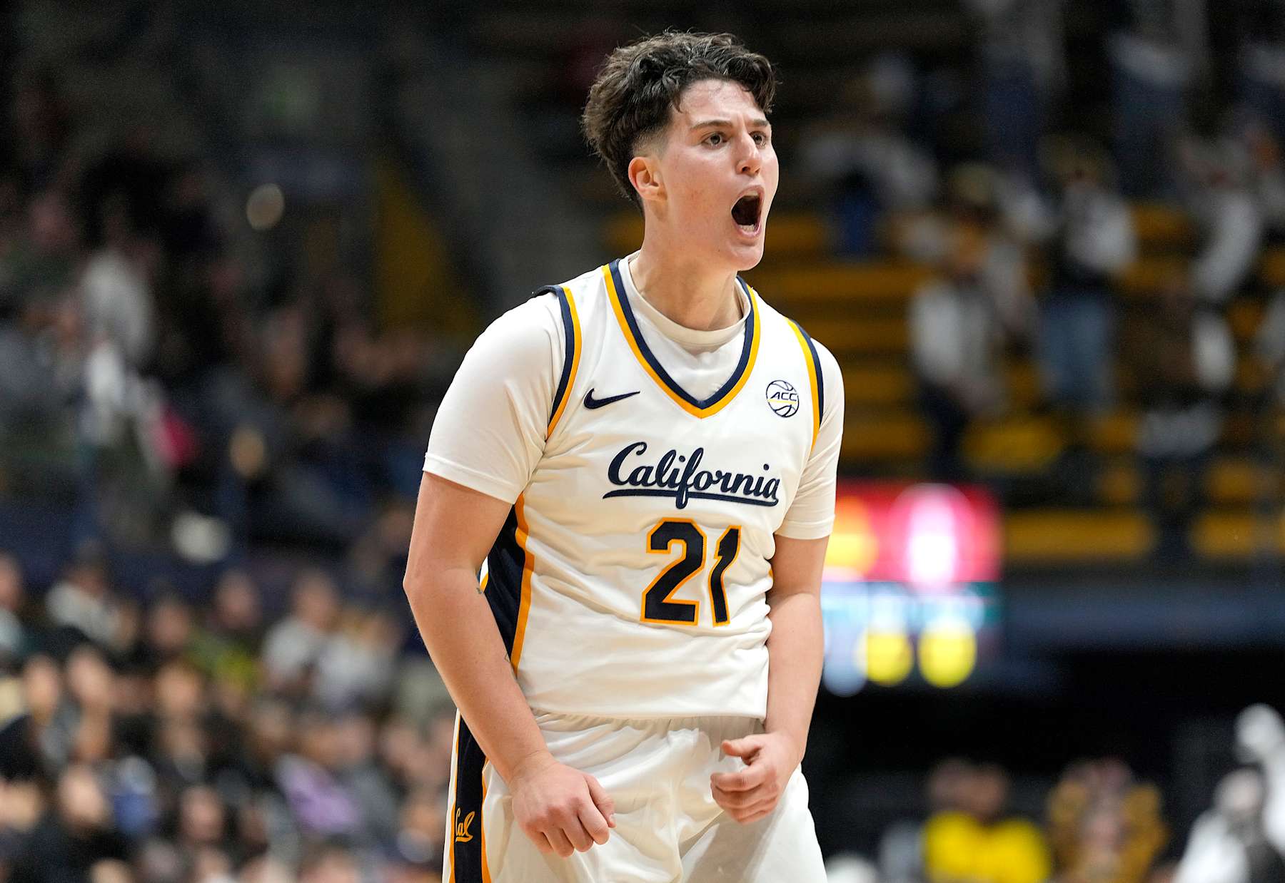 BERKELEY, CALIFORNIA - DECEMBER 13: Ioanna Krimili #21 of the California Golden Bears reacts after making a three-point shot against the Stanford Cardinal during the first half of a women's NCAA basketball game at Haas Pavilion on December 13, 2024 in Berkeley, California. (Photo by Thearon W. Henderson/Getty Images)