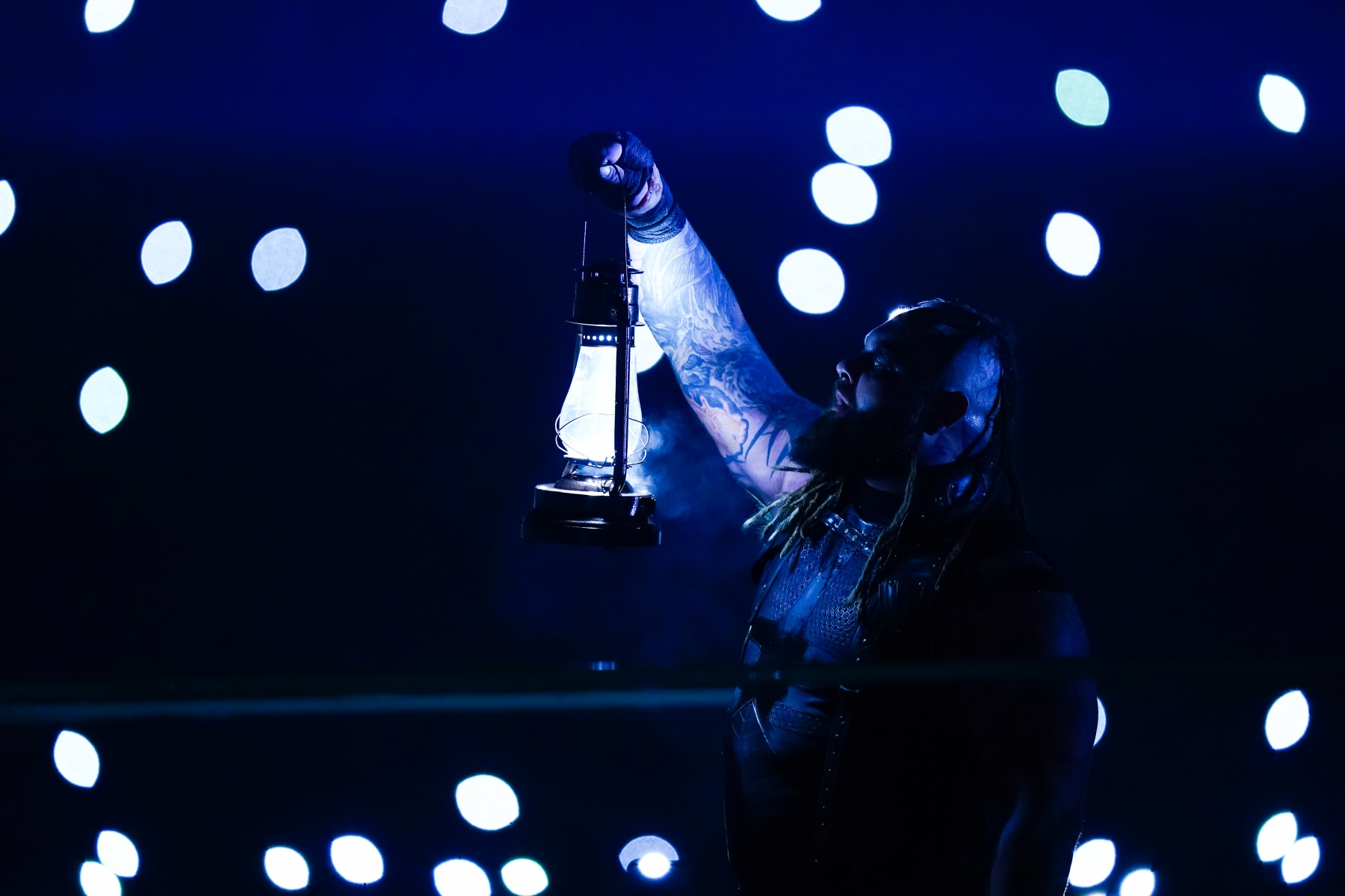 SAN ANTONIO, TEXAS - JANUARY 28: Bray Wyatt enters the arena to fight in the pitch black event during the WWE Royal Rumble event at the Alamodome on January 28, 2023 in San Antonio, Texas. (Photo by Alex Bierens de Haan/Getty Images)
