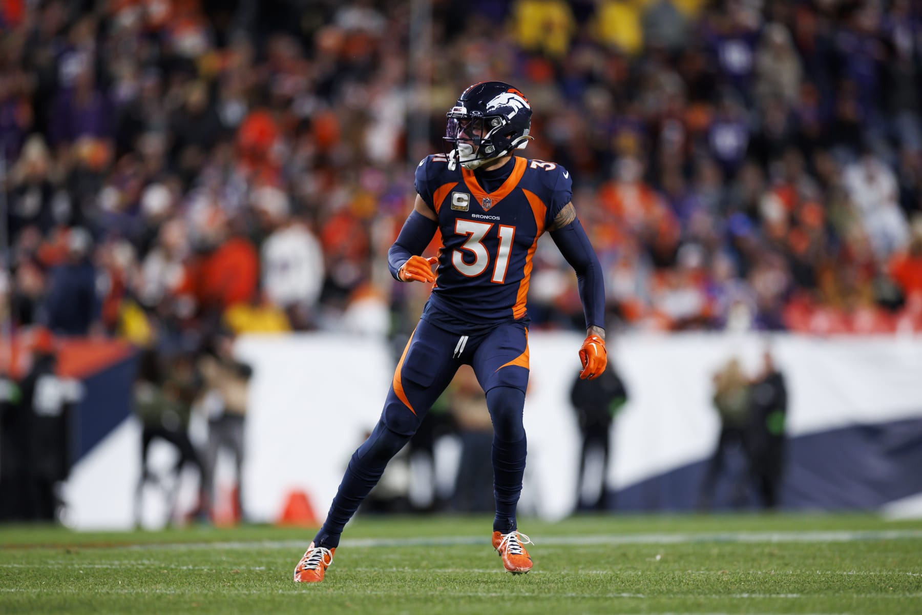 DENVER, COLORADO - NOVEMBER 19: Justin Simmons #31 of the Denver Broncos defends in coverage during an NFL football game against the Minnesota Vikings at Empower Field at Mile High on November 19, 2023 in Denver, Colorado. (Photo by Ryan Kang/Getty Images)