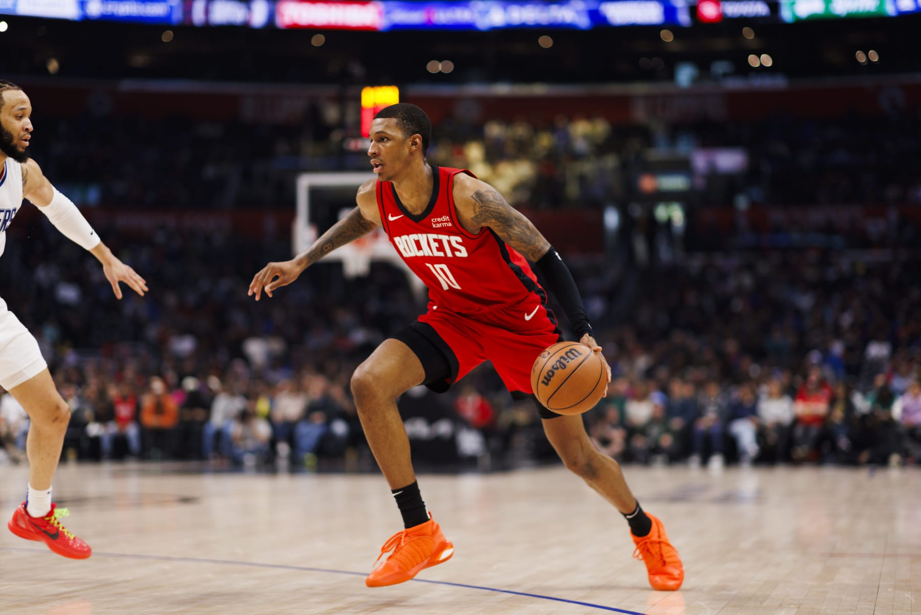 LOS ANGELES, CA - APRIL 14: Houston Rockets forward Jabari Smith Jr. (10) dribbles during an the Los Angeles Clippers game versus the Houston Rockets on April 14, 2024, at Crypto.com Arena in Los Angeles, CA. (Photo by Ric Tapia/Icon Sportswire via Getty Images)