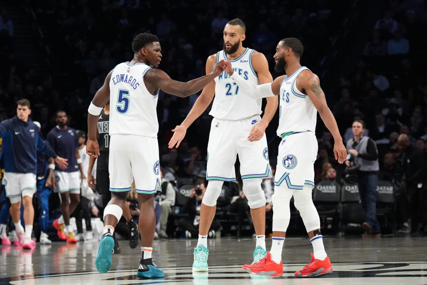 BROOKLYN, NY - JANUARY 25: The Anthony Edwards #5, Rudy Gobert #27 and Mike Conley #10 of the Minnesota Timberwolves celebrate during the game against the Brooklyn Nets on January 25, 2024 at Barclays Center in Brooklyn, New York. NOTE TO USER: User expressly acknowledges and agrees that, by downloading and or using this Photograph, user is consenting to the terms and conditions of the Getty Images License Agreement. Mandatory Copyright Notice: Copyright 2024 NBAE (Photo by Jesse D. Garrabrant/NBAE via Getty Images)
