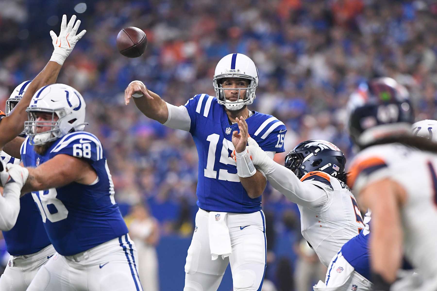 INDIANAPOLIS, IN - AUGUST 11: Indianapolis Colts Quarterback Joe Flacco (15) passes during the NFL Preseason game between the Denver Broncos and the Indianapolis Colts on August 11, 2024, at Lucas Oil Stadium in Indianapolis, Indiana. (Photo by Michael Allio/Icon Sportswire via Getty Images)