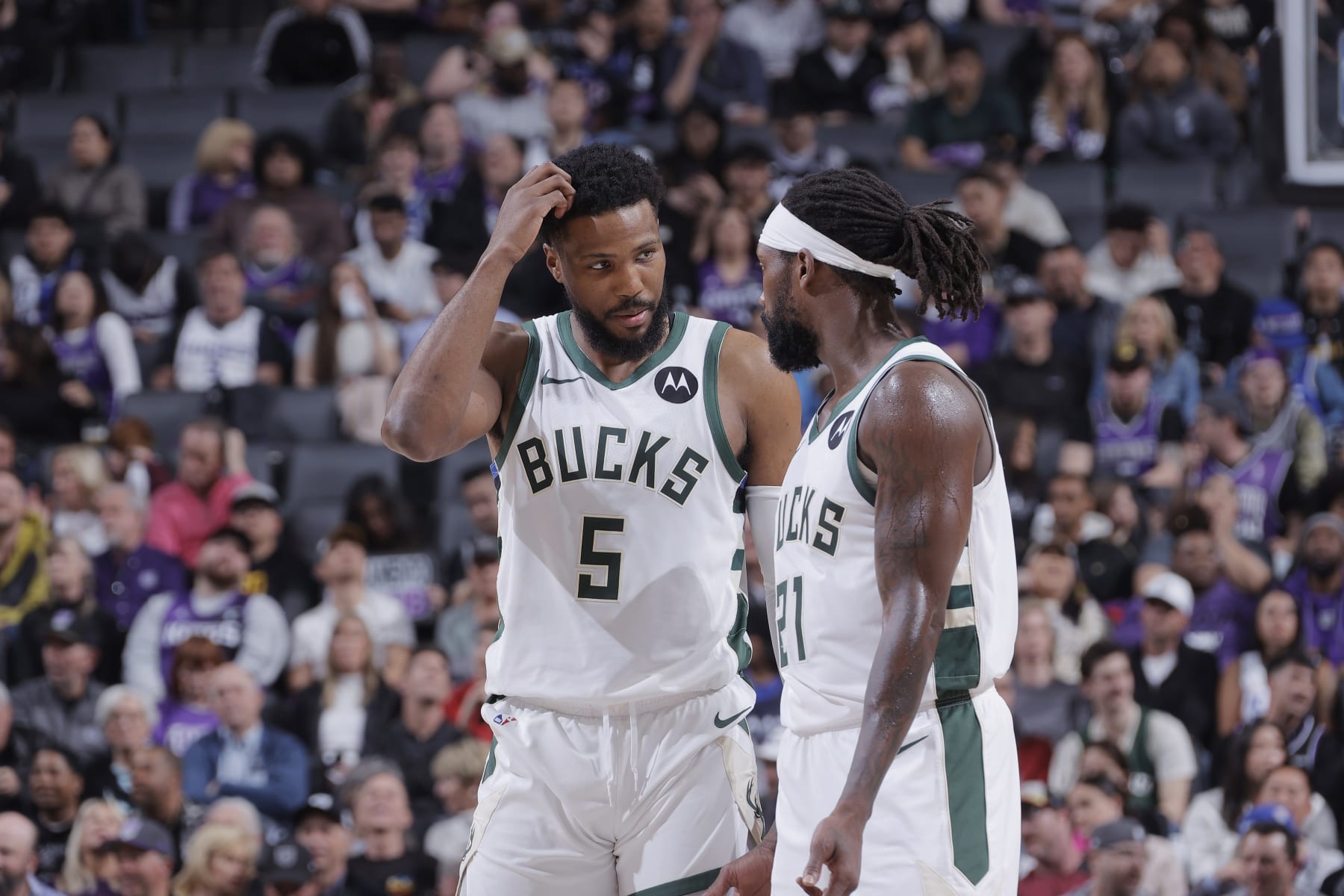 SACRAMENTO, CA - MARCH 12: Malik Beasley #5 and Patrick Beverley #21 of the Milwaukee Bucks talk during the game against the Sacramento Kings on March 12, 2024 at Golden 1 Center in Sacramento, California. NOTE TO USER: User expressly acknowledges and agrees that, by downloading and or using this photograph, User is consenting to the terms and conditions of the Getty Images Agreement. Mandatory Copyright Notice: Copyright 2024 NBAE (Photo by Rocky Widner/NBAE via Getty Images)