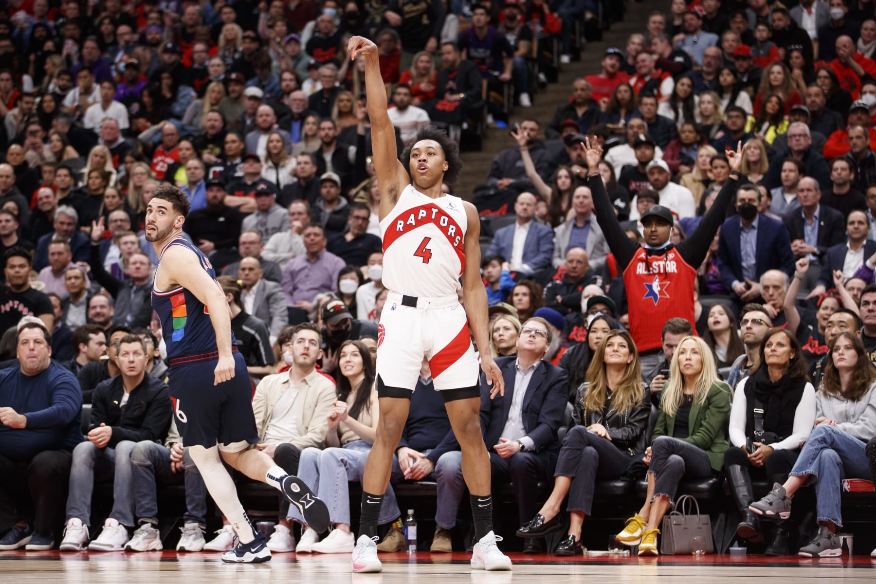 TORONTO, ON - APRIL 28:  Scottie Barnes #4 of the Toronto Raptors follows through on a shot over Georges Niang #20 of the Philadelphia 76ers during Game Six of the Eastern Conference First Round against the Toronto Raptors at Scotiabank Arena on April 28, 2022 in Toronto, Canada. NOTE TO USER: User expressly acknowledges and agrees that, by downloading and or using this Photograph, user is consenting to the terms and conditions of the Getty Images License Agreement. (Photo by Cole Burston/Getty Images)