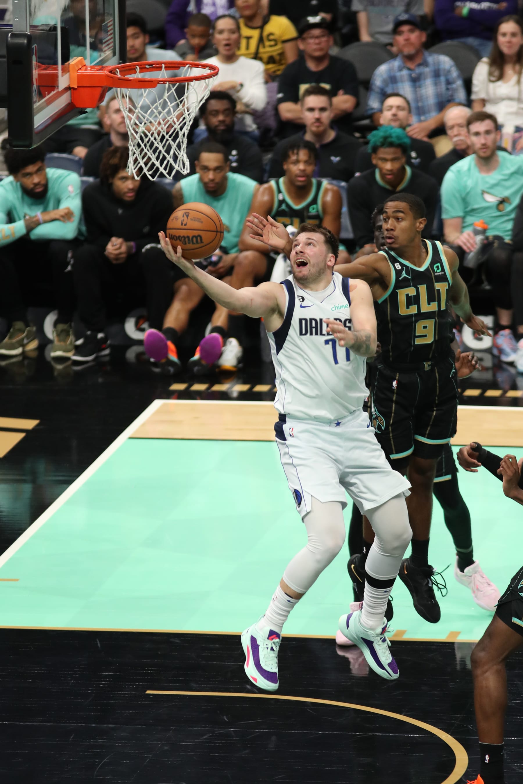 CHARLOTTE, NC - MARCH 26: Luka Doncic #77 of the Dallas Mavericks shoots the ball during the game against the Charlotte Hornets on March 26, 2023 at Spectrum Center in Charlotte, North Carolina. NOTE TO USER: User expressly acknowledges and agrees that, by downloading and or using this photograph, User is consenting to the terms and conditions of the Getty Images License Agreement.  Mandatory Copyright Notice:  Copyright 2023 NBAE (Photo by Brock Williams-Smith/NBAE via Getty Images)