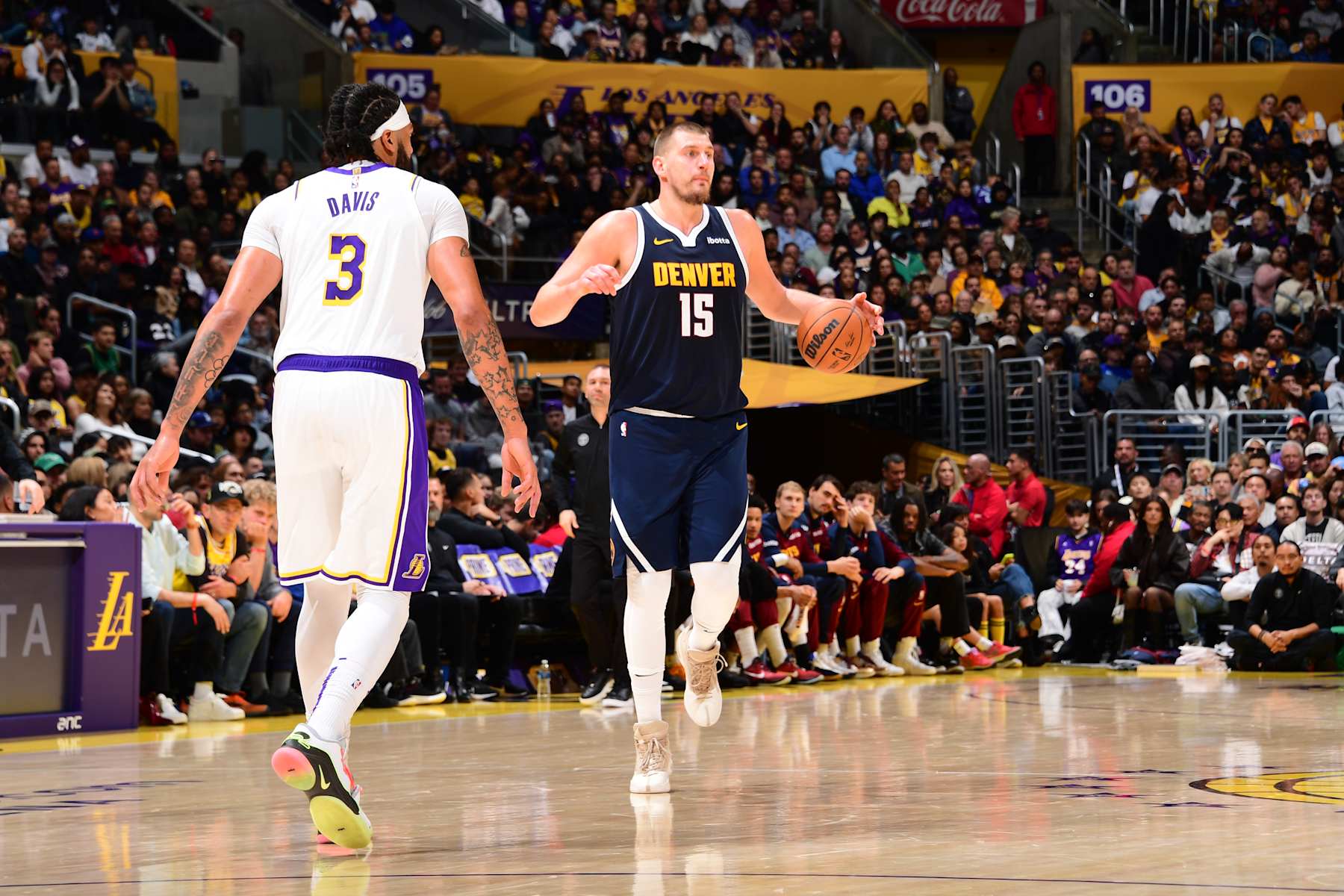 LOS ANGELES, CA - NOVEMBER 23: Nikola Jokic #15 of the Denver Nuggets dribbles the ball during the game against the Los Angeles Lakers on November 23, 2024 at Crypto.Com Arena in Los Angeles, California. NOTE TO USER: User expressly acknowledges and agrees that, by downloading and/or using this Photograph, user is consenting to the terms and conditions of the Getty Images License Agreement. Mandatory Copyright Notice: Copyright 2024 NBAE (Photo by Adam Pantozzi/NBAE via Getty Images)