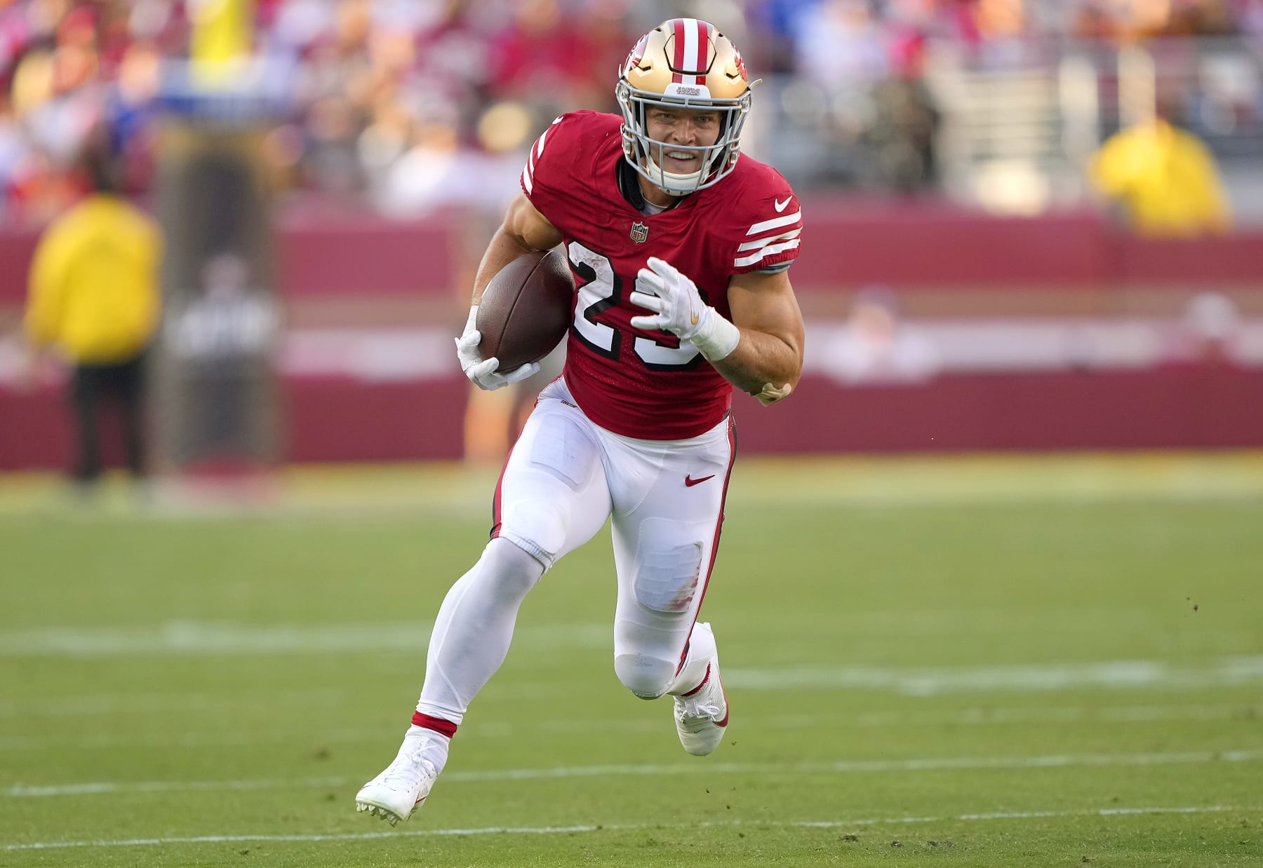 SANTA CLARA, CALIFORNIA - SEPTEMBER 21: Christian McCaffrey #23 of the San Francisco 49ers carries the ball against the New York Giants during the second quarter of an NFL football game at Levi's Stadium on September 21, 2023 in Santa Clara, California. (Photo by Thearon W. Henderson/Getty Images)