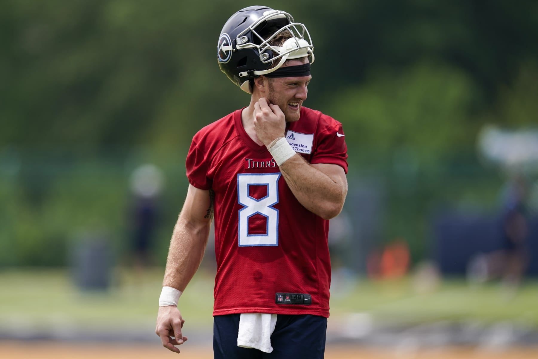Tennessee Titans quarterback Will Levis (8) walks across the field during the NFL football team's OTA practices, Tuesday, May 23, 2023, in Nashville, Tenn. (AP Photo/George Walker IV) Tennessee Titans quarterback Will Levis (8) walks across the field during the NFL football team's OTA practices, Tuesday, May 23, 2023, in Nashville, Tenn. (AP Photo/George Walker IV)