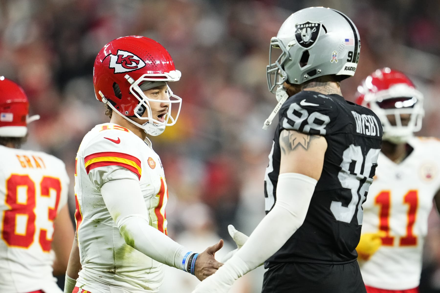 LAS VEGAS, NEVADA - NOVEMBER 26: Maxx Crosby #98 of the Las Vegas Raiders and Patrick Mahomes #15 of the Kansas City Chiefs during the fourth quarter of a game at Allegiant Stadium on November 26, 2023 in Las Vegas, Nevada. (Photo by Jeff Bottari/Getty Images)